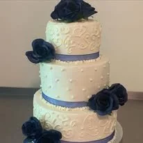 white and blue floral scroll work tier.jpg