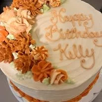 orange floral bday cake.jpg