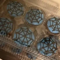 blue spiderweb cupcakes.jpg