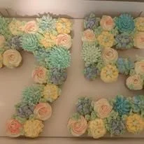 75 flower topped cupcake cake.jpg