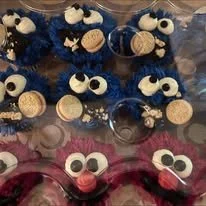 elmo and cookie monster cupcakes.jpg