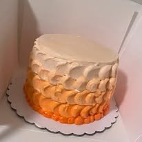 orange ombre scalloped smash cake.jpg