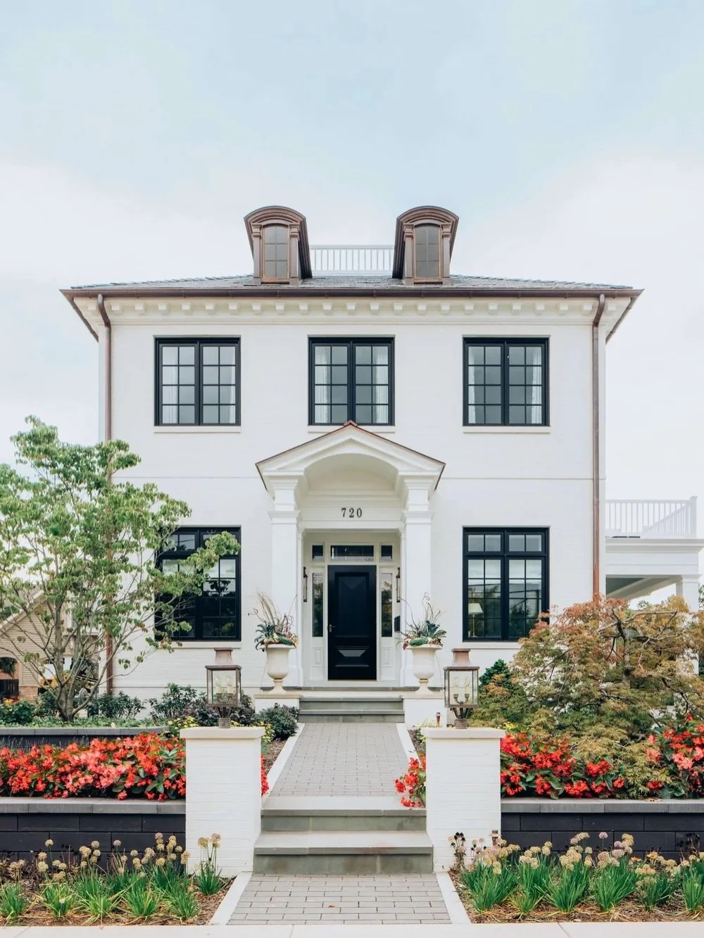Prescott: A Study in Restraint on a Difficult Lot

In a walkable pocket of East Grand Rapids, Michigan, where century-old homes sit close enough to share porch light, we took on a lot most firms would have called a liability. Narrow, hemmed in, offer