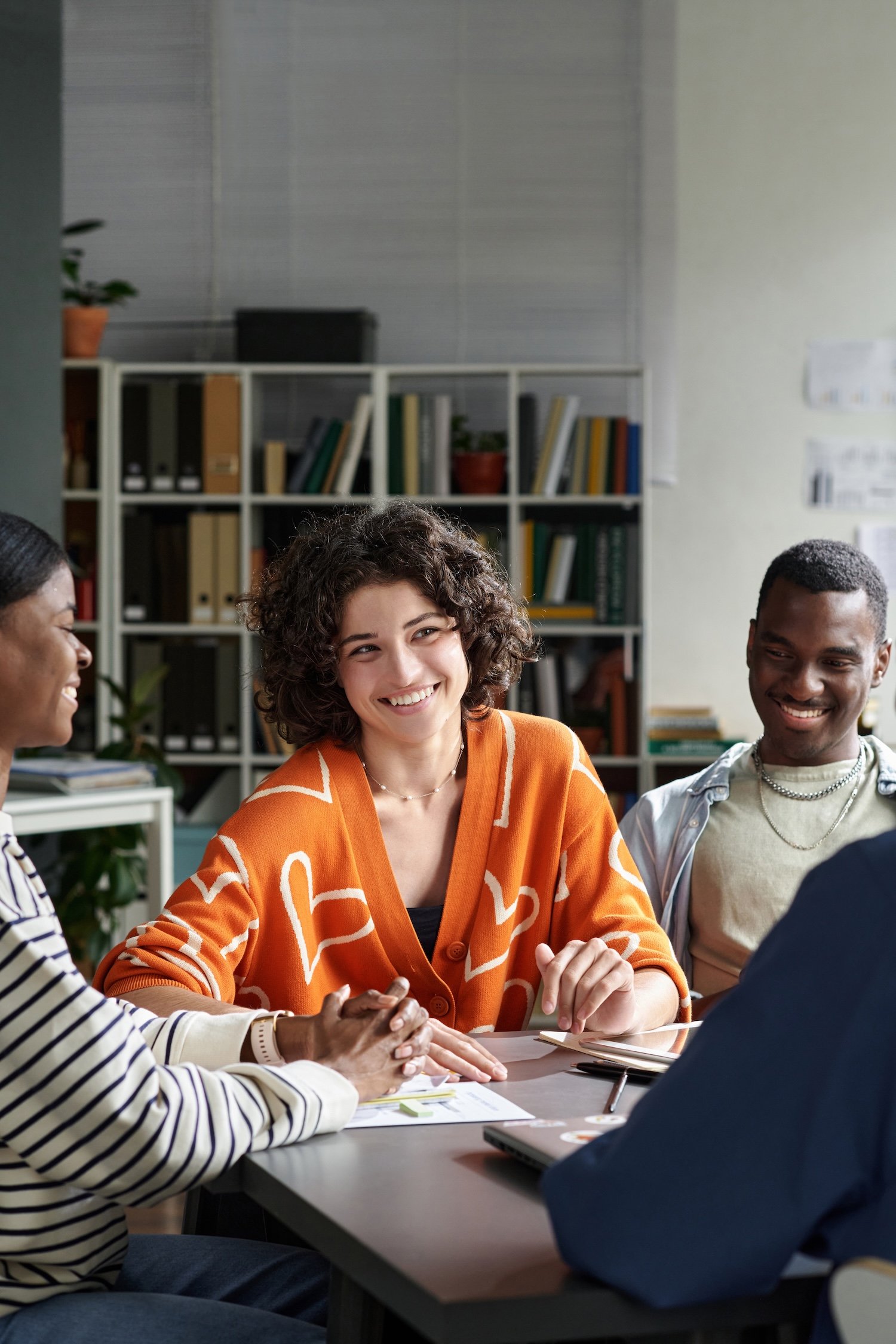 Woman leading a meeting with confidence.