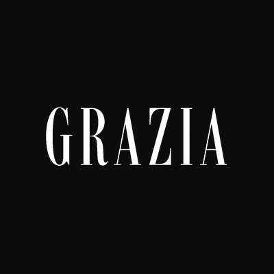 The word "GRAZIA" written in white capital letters on a black background.