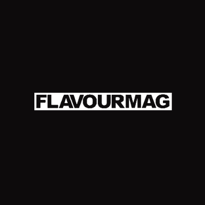 Black background with the word 'FLAVOURMAG' in white uppercase letters inside a black rectangle