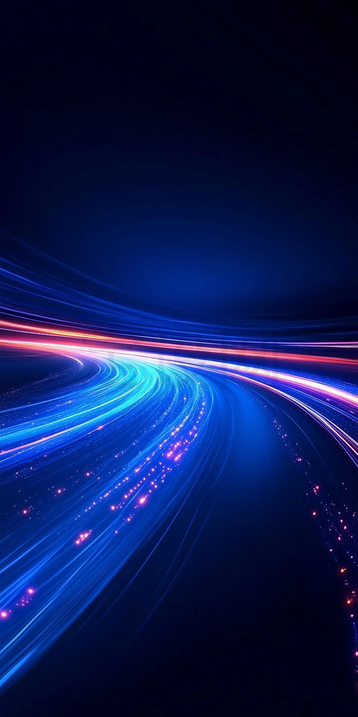 Futuristic abstract scene with streaks of blue, red, and pink light trails moving through a dark space, creating a sense of motion and speed.