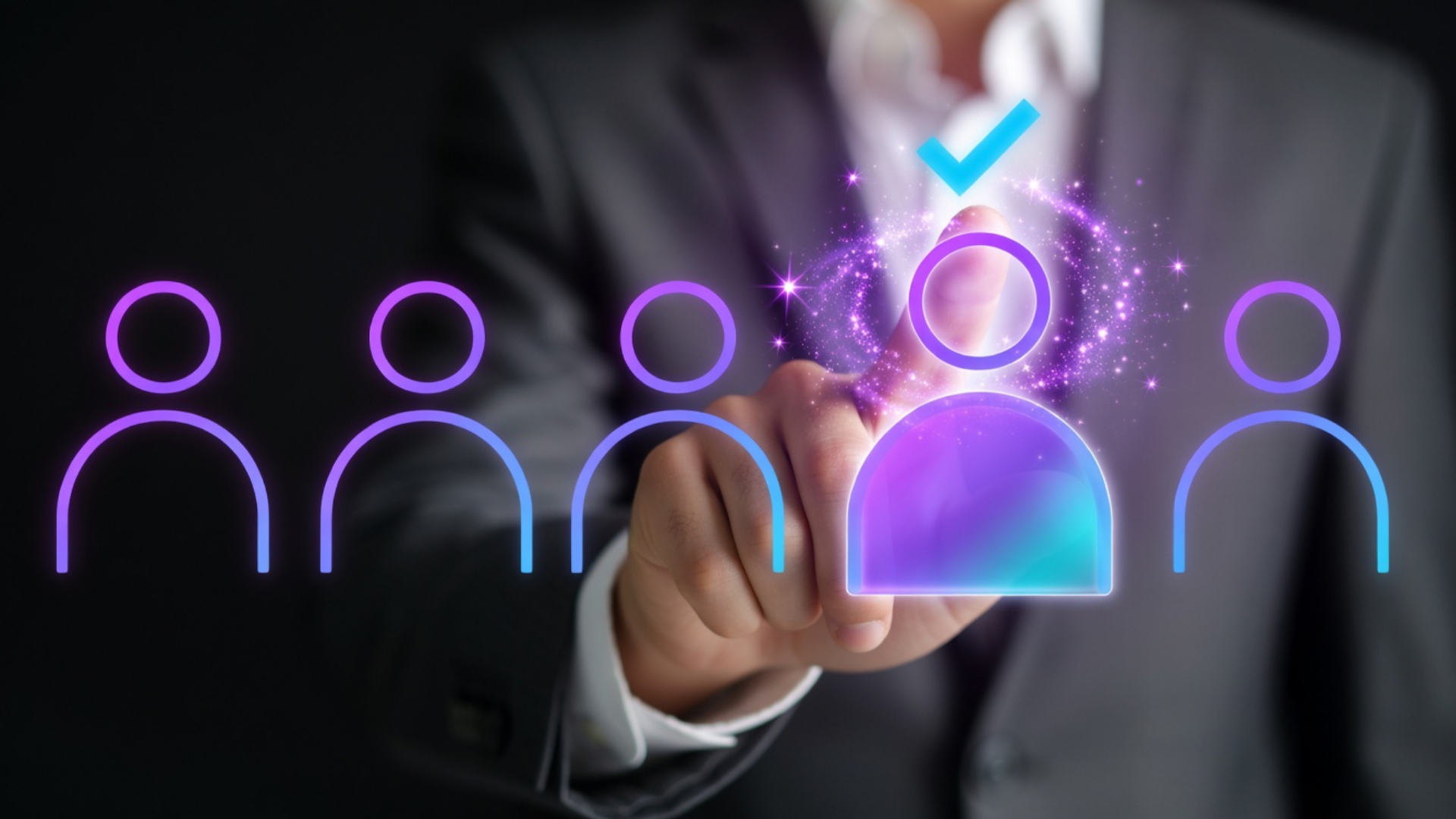 A person in a suit points at a holographic display of stylized human figures, with one figure highlighted by a blue checkmark and surrounded by a glowing purple aura.