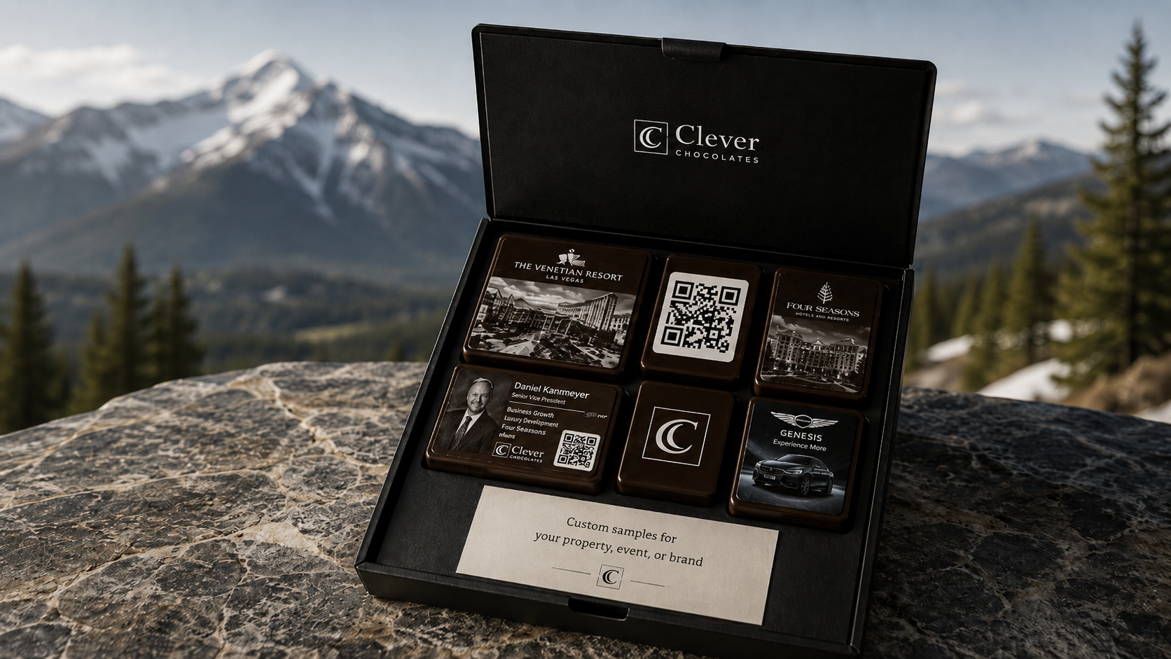 Custom Clever Chocolates sample box featuring hotel and resort designs, branded chocolate squares and QR-enabled guest experiences.