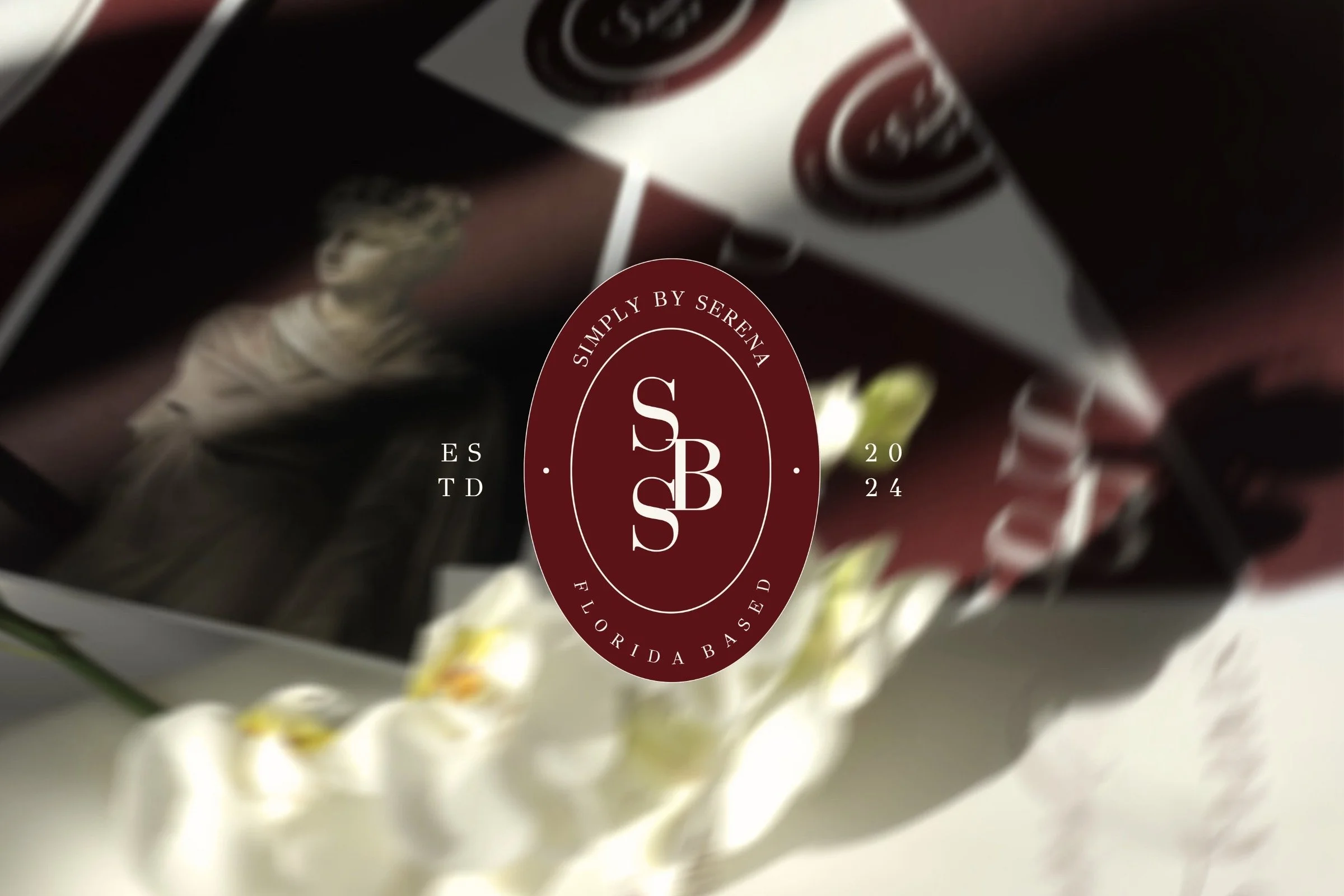 Close-up of a dark-colored food package with a maroon and white circular label that reads "Simply by Serena" and "Florida Basted."