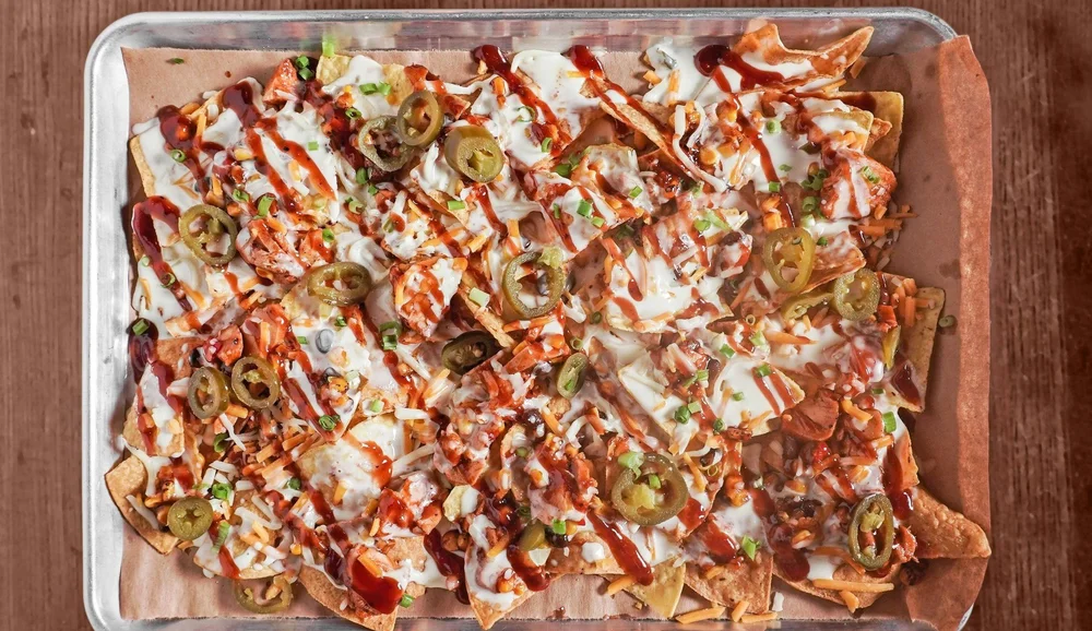 BBQ chicken nachos on a sheet pan at Windward Tavern in Alpharetta, Georgia