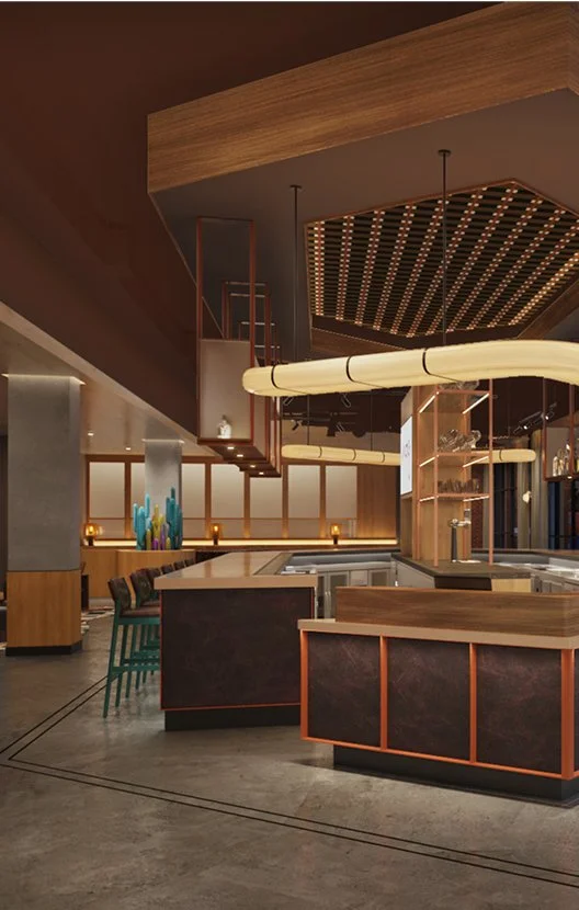 Modern bar area with wooden accents, dark countertops, and colorful decorative cacti on the counter; warm ambient lighting and geometric ceiling design.