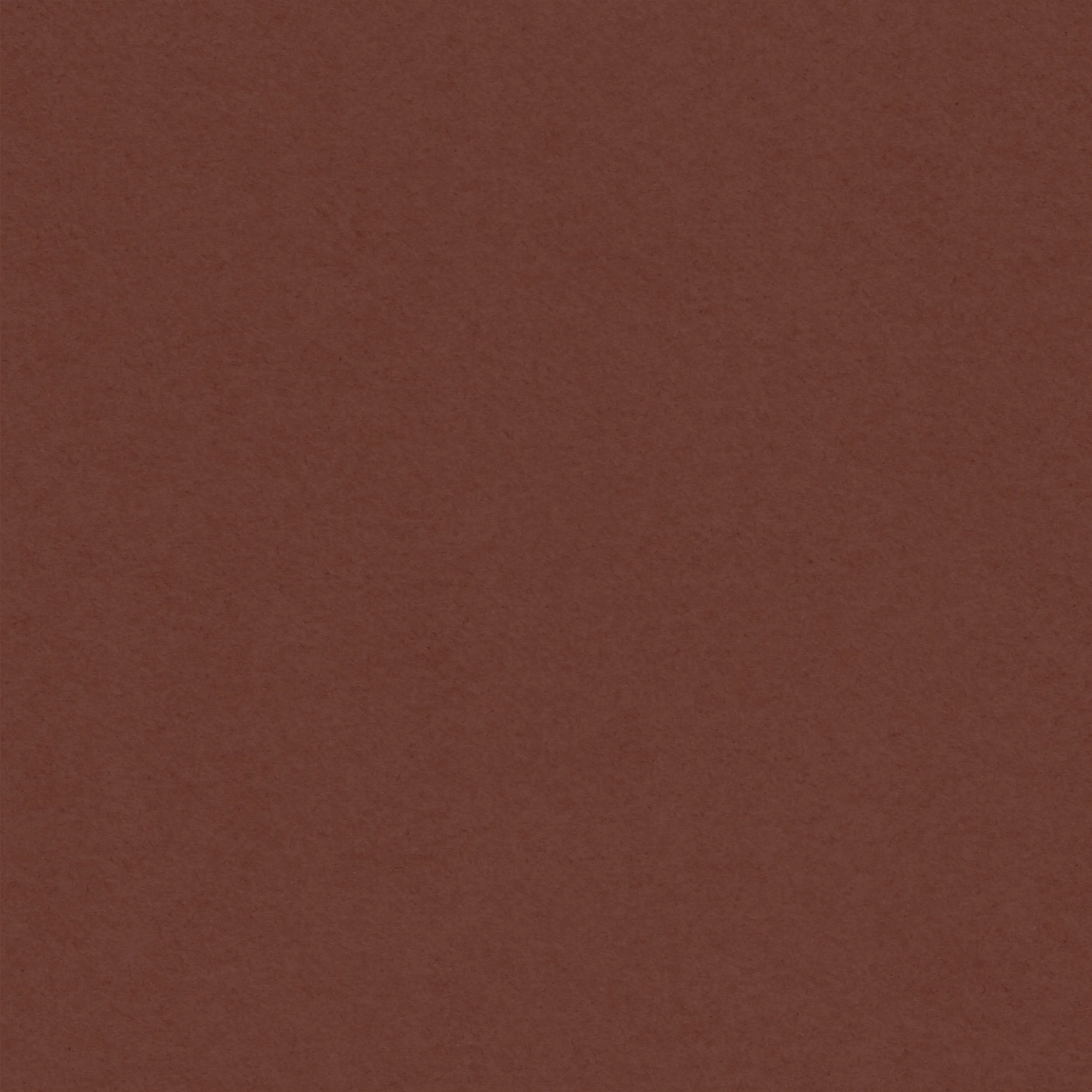 Close-up of a brown, subtly textured surface.