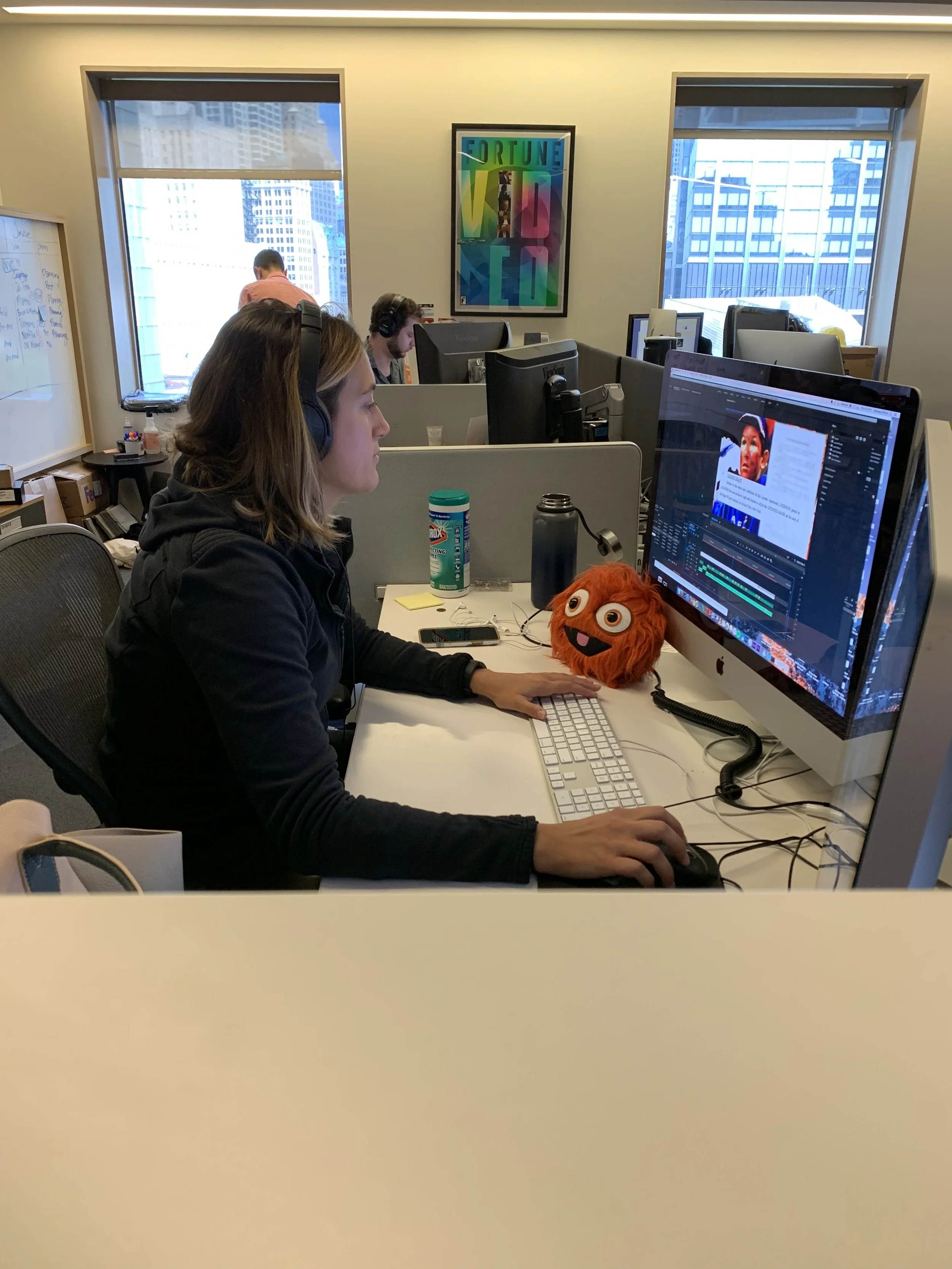 Vanessa Giolitto working at Sports Illustrated newsroom in NYC.