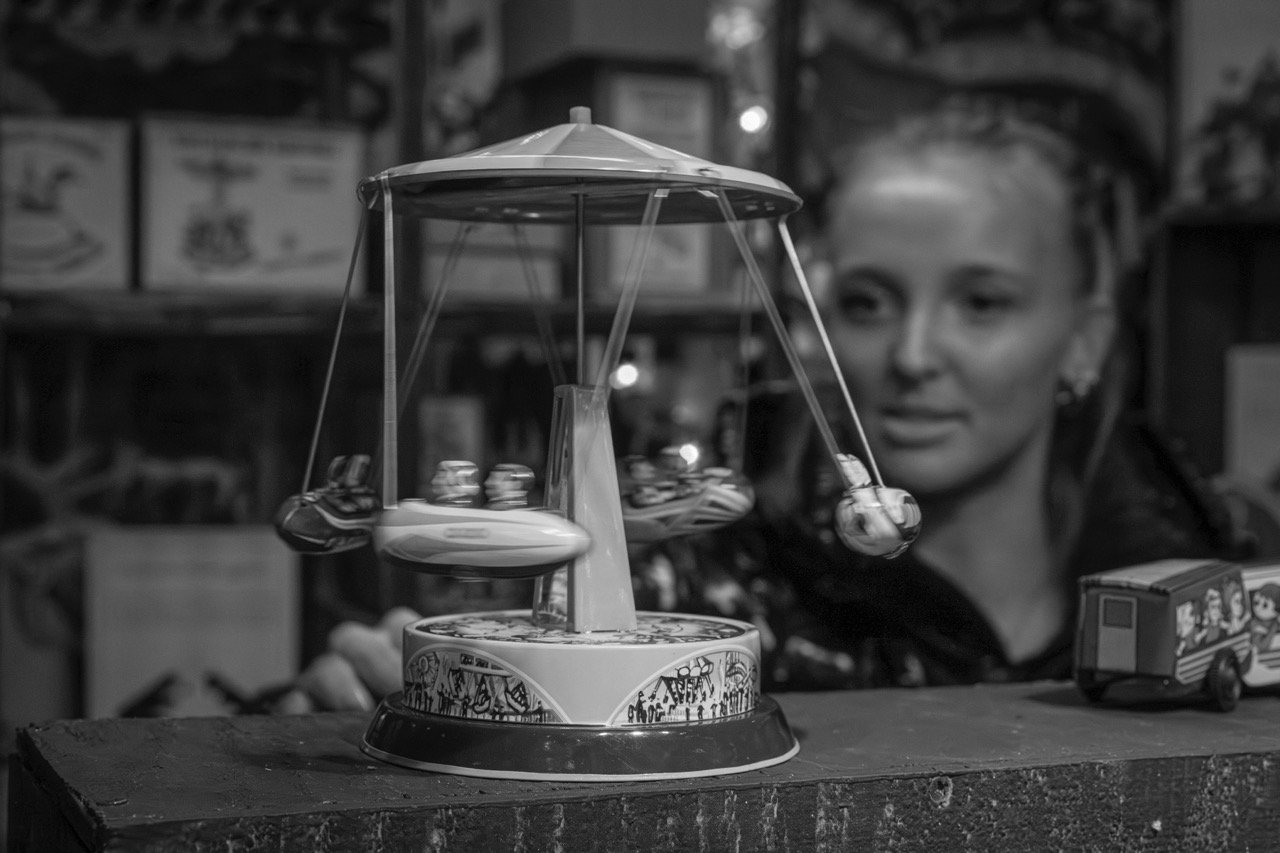 Amused gal with spinning toy- Large.jpeg