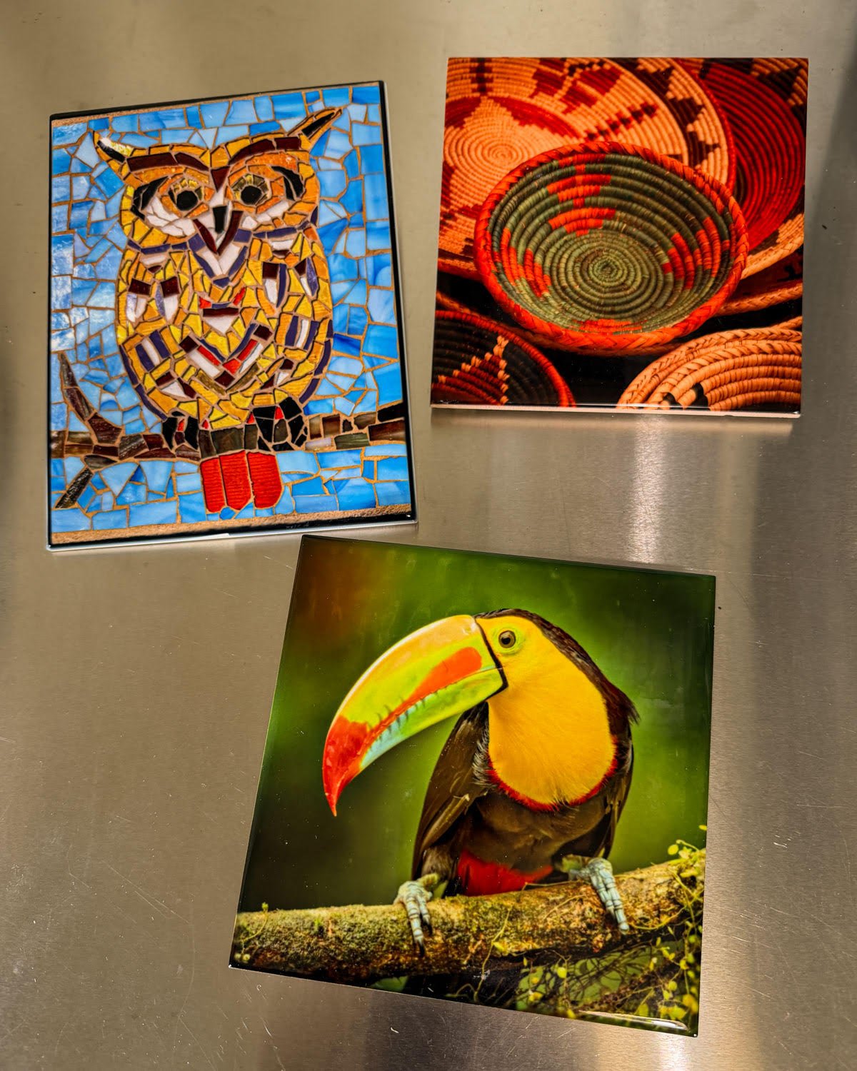 Handcrafted trivets featuring wildlife, travel, and nature-inspired artwork by Linda Detwiler Burner