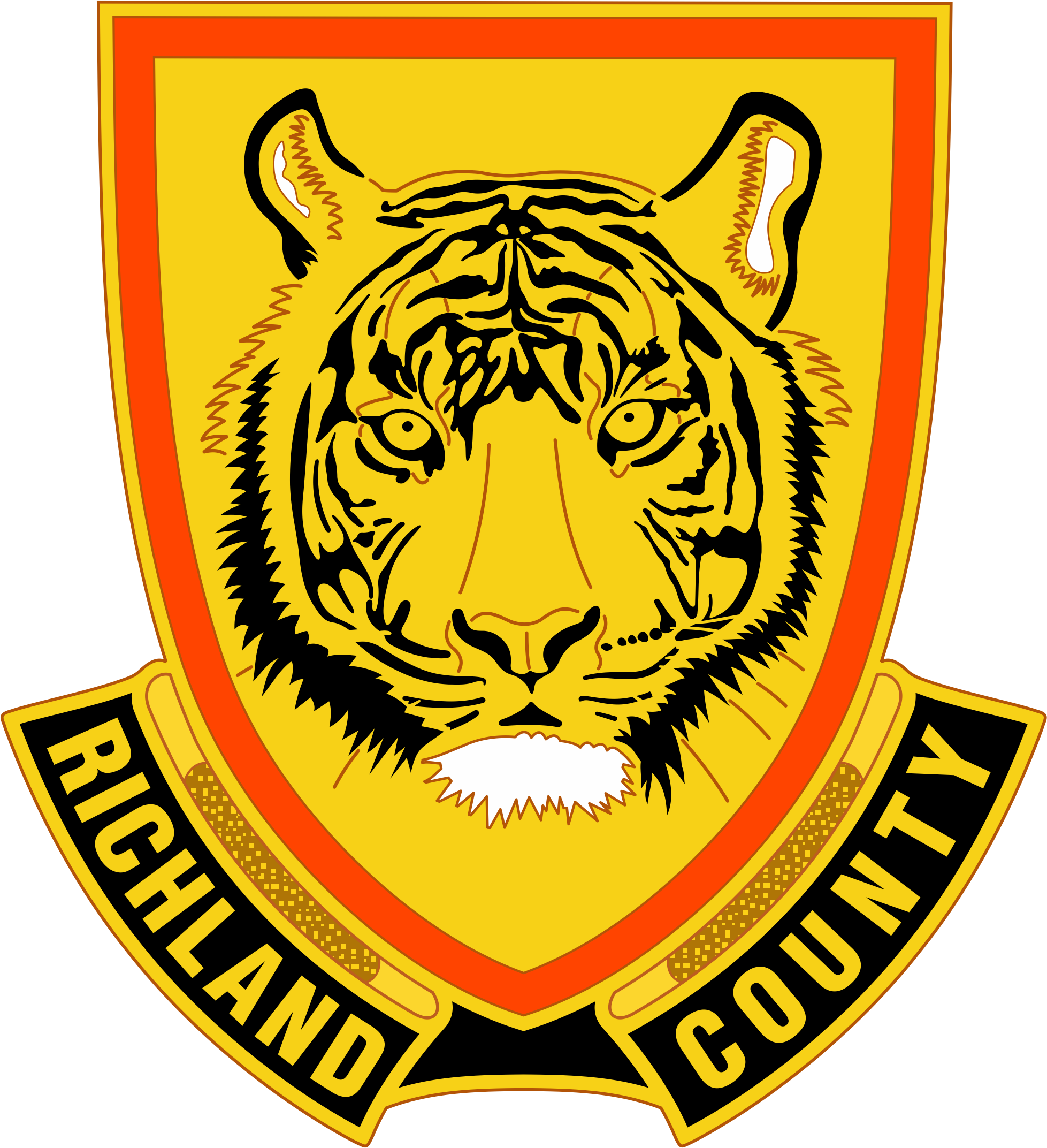 Emblem of the Fire Department, featuring a tiger's face in the center, with orange and yellow colors and text surrounding it.