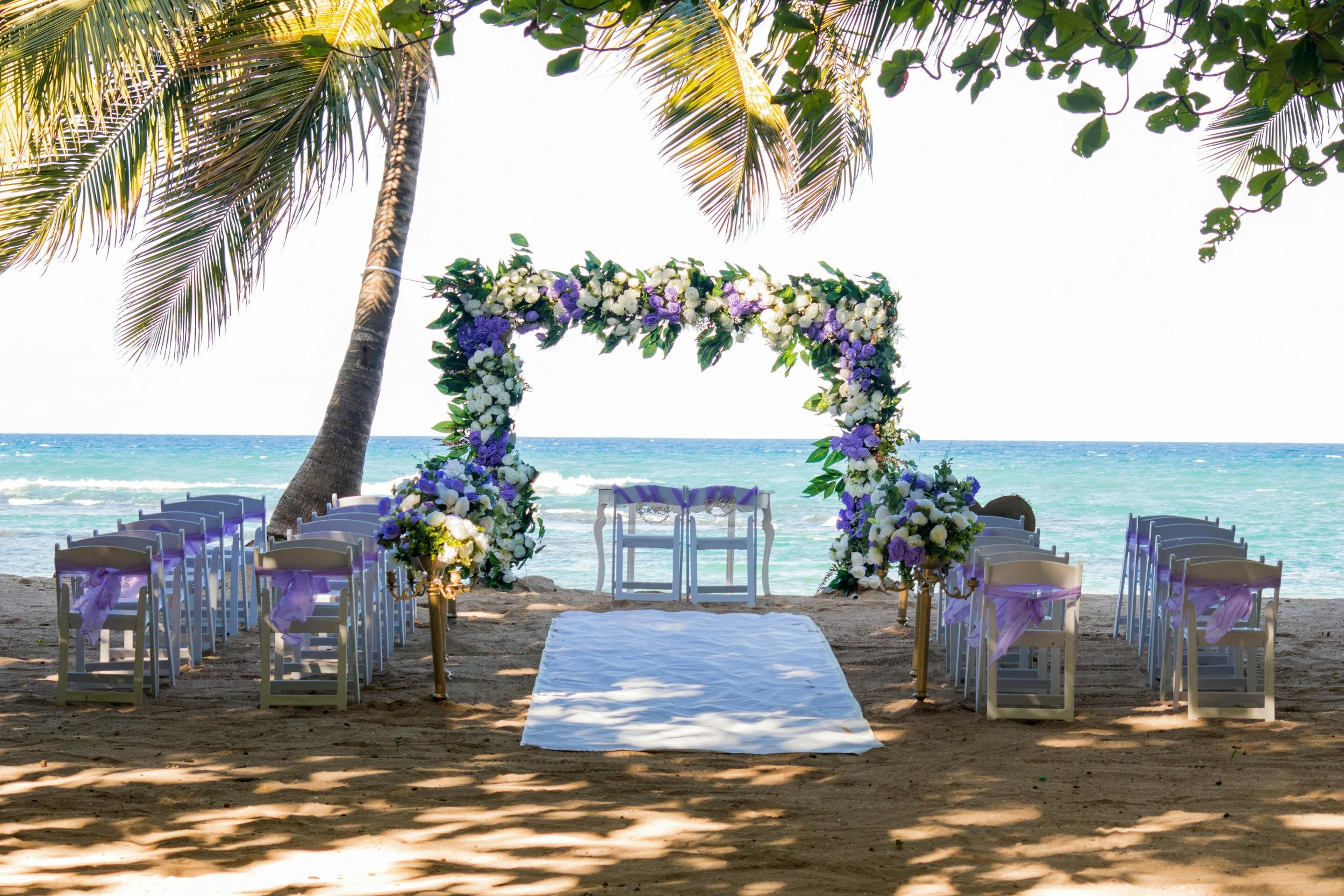 Full Wedding floral Arch on beach with palm trees Clearwater 
