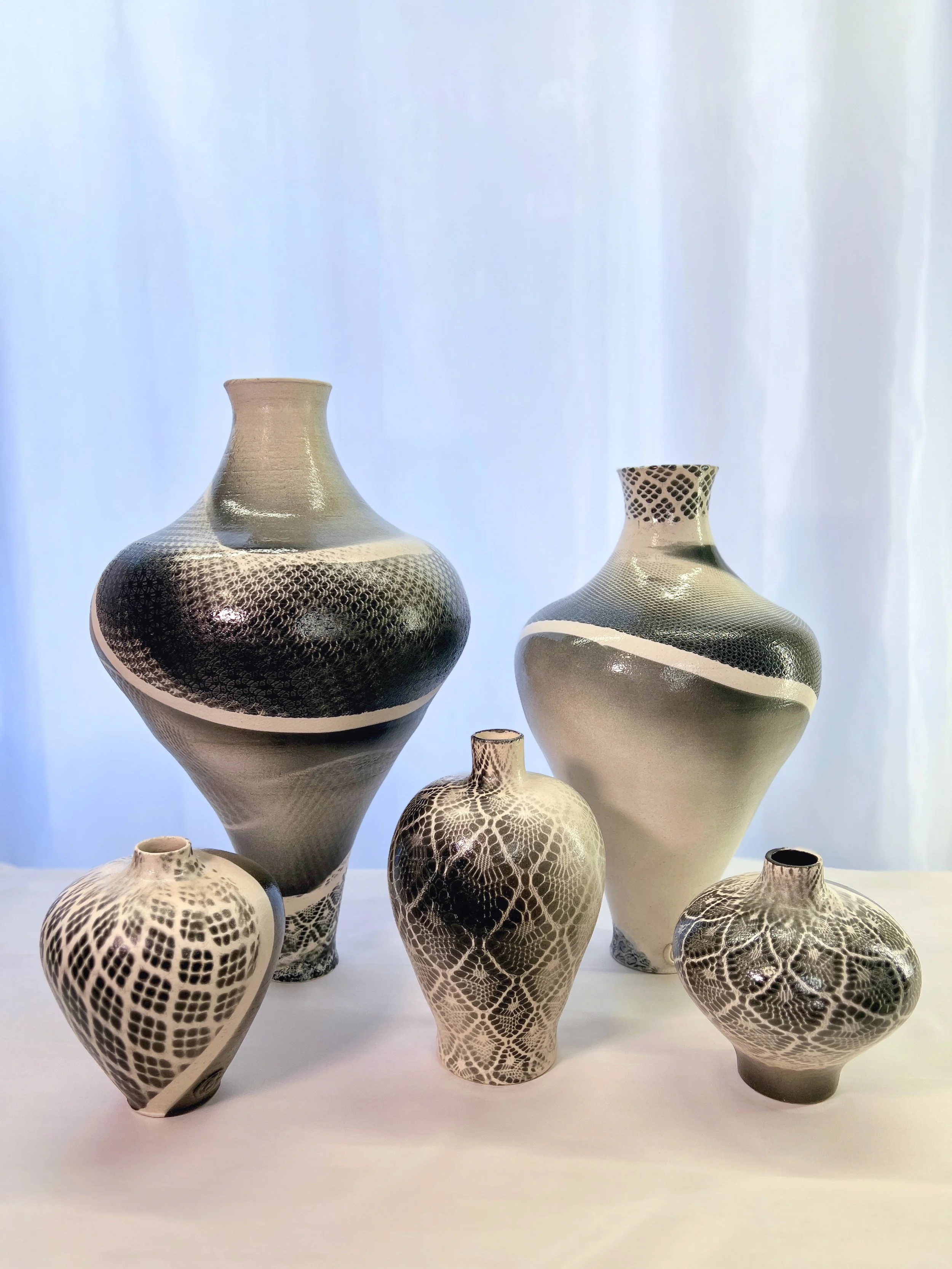 A family connected by line and form.