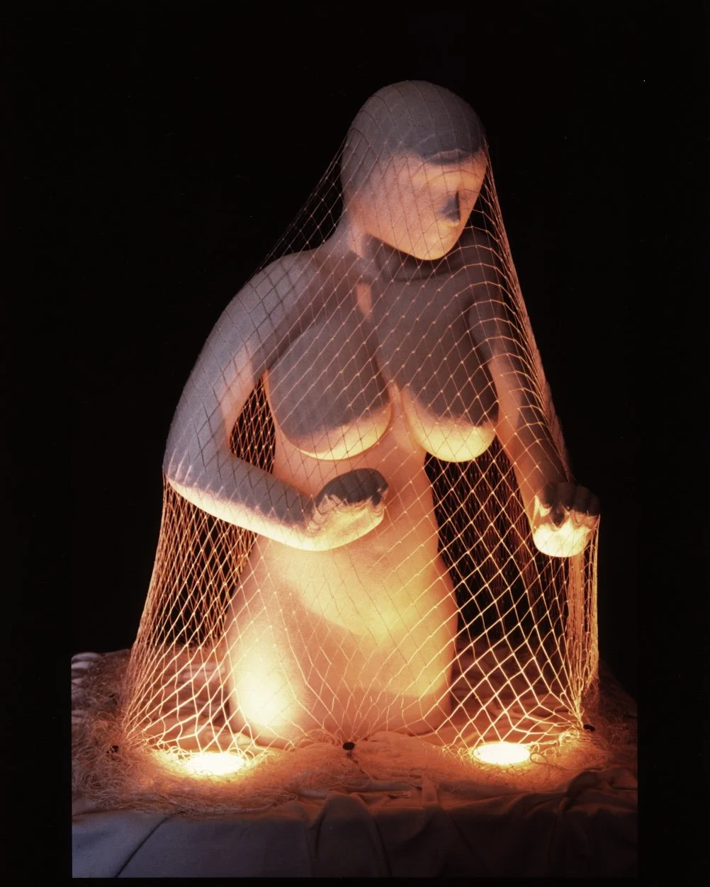 Trapped
A figure illuminated yet contained—reflecting vulnerability and the experience of being seen without being reached.