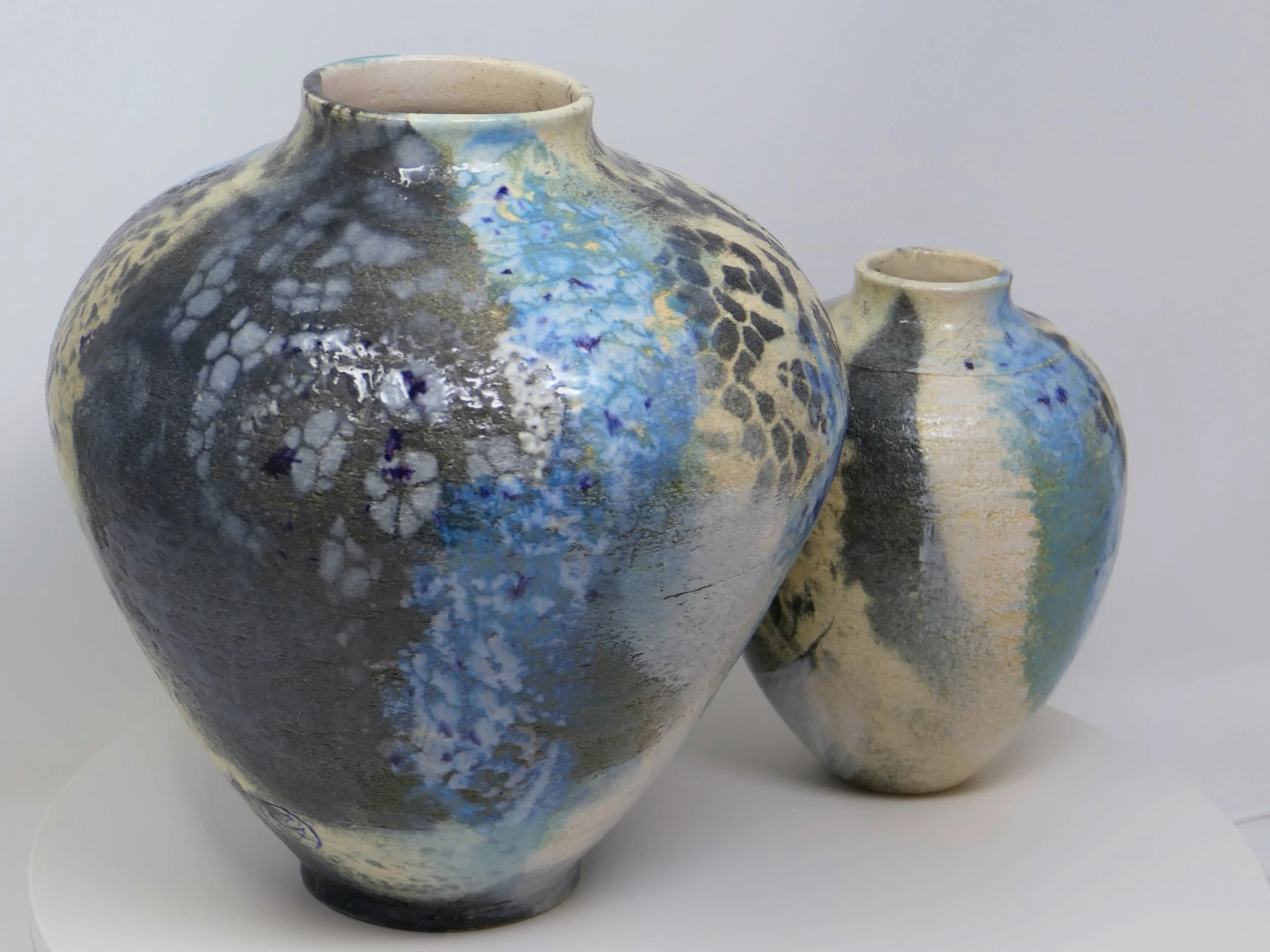 Soft blues and lace-like patterns found their way across the surface.