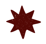 A maroon-colored star-shaped object with a textured surface.