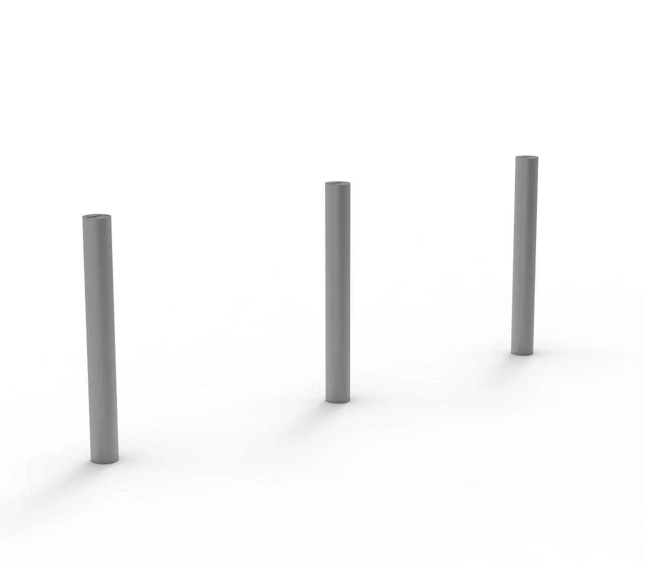 Three vertical stainless steel bollards