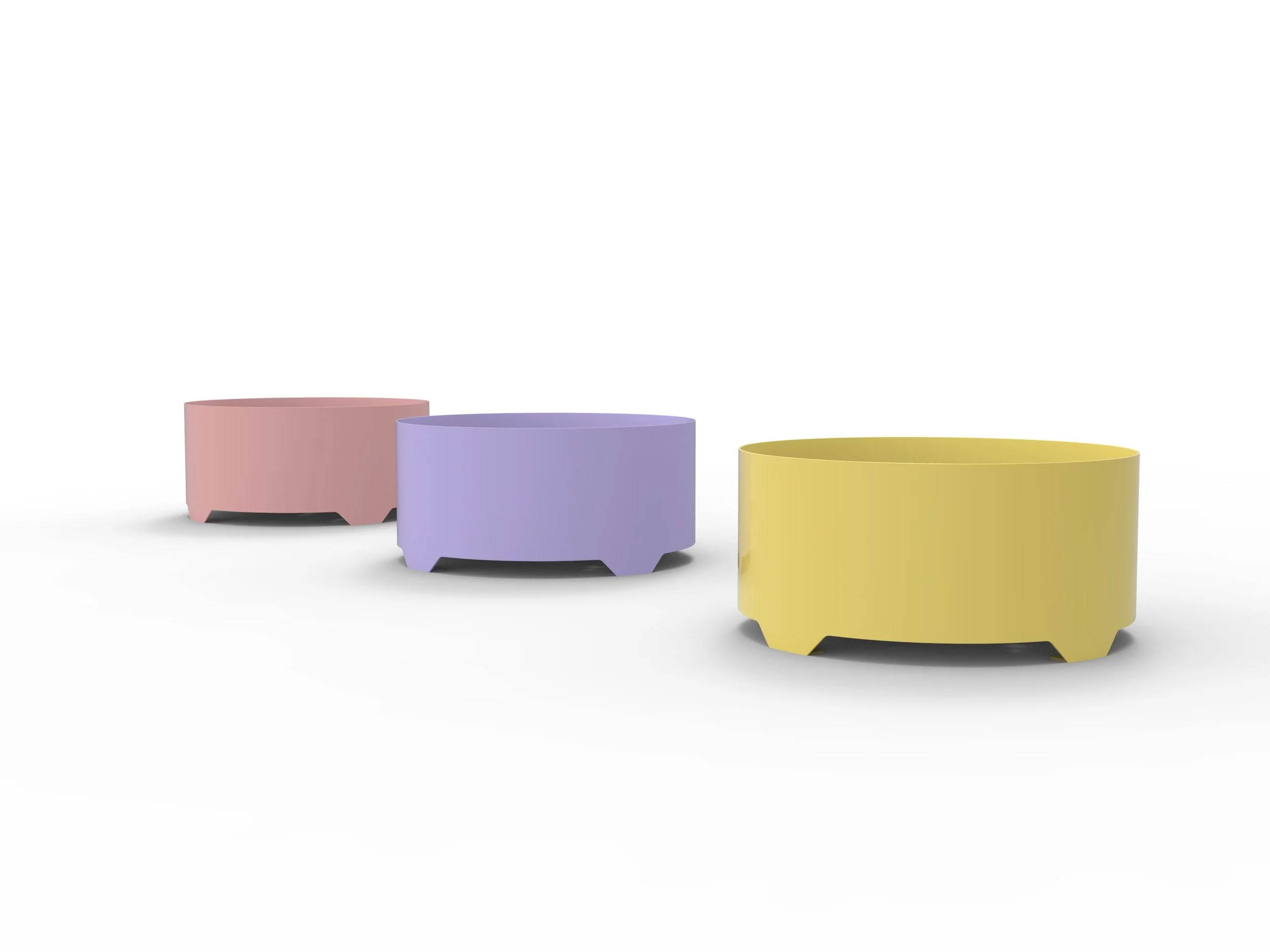 Three pastel-colored round planters in pink, purple, and yellow, arranged in a line on a white background.