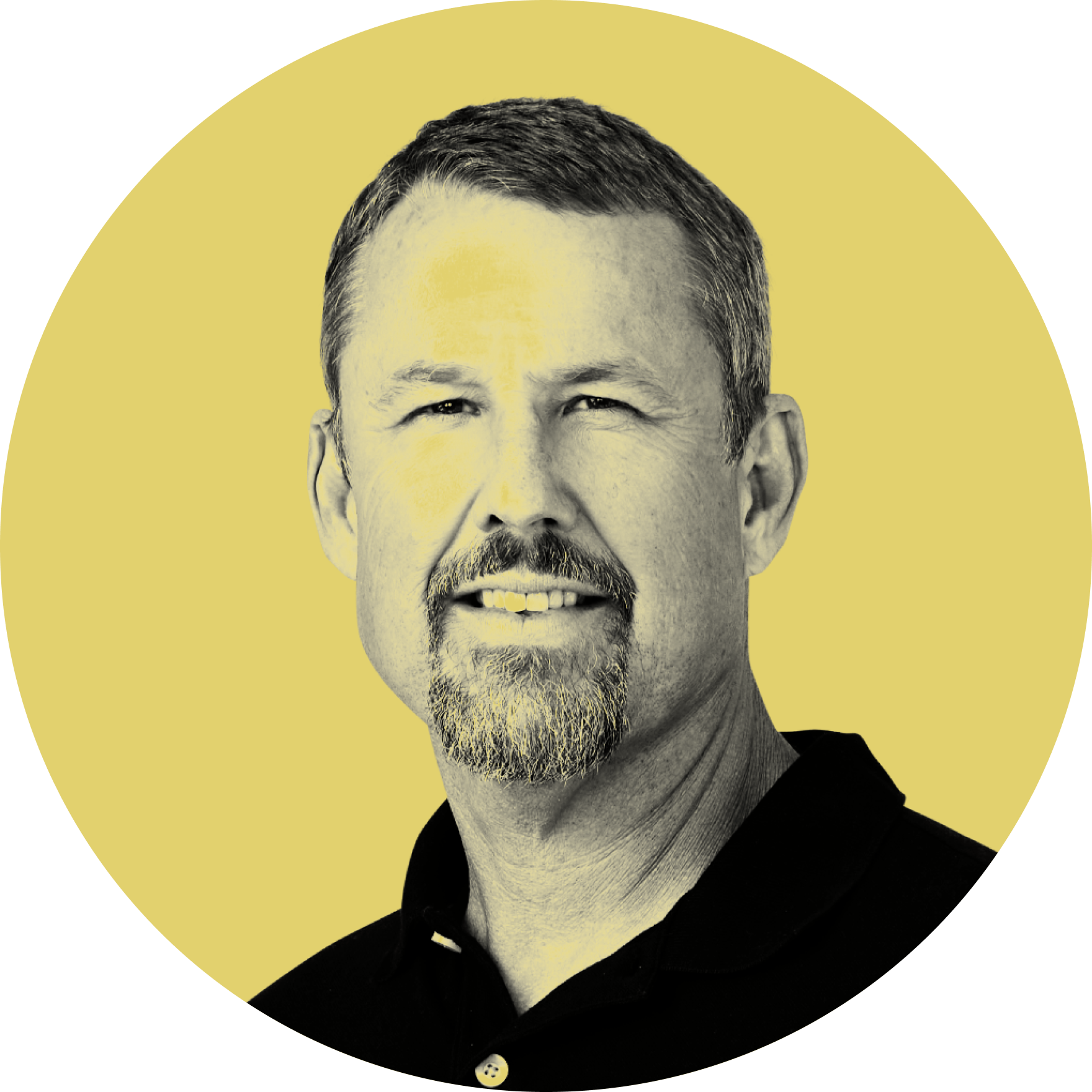 Black and white portrait of a middle-aged man with short, dark hair and a goatee, wearing a dark jacket with a shirt underneath, set against a yellow background.