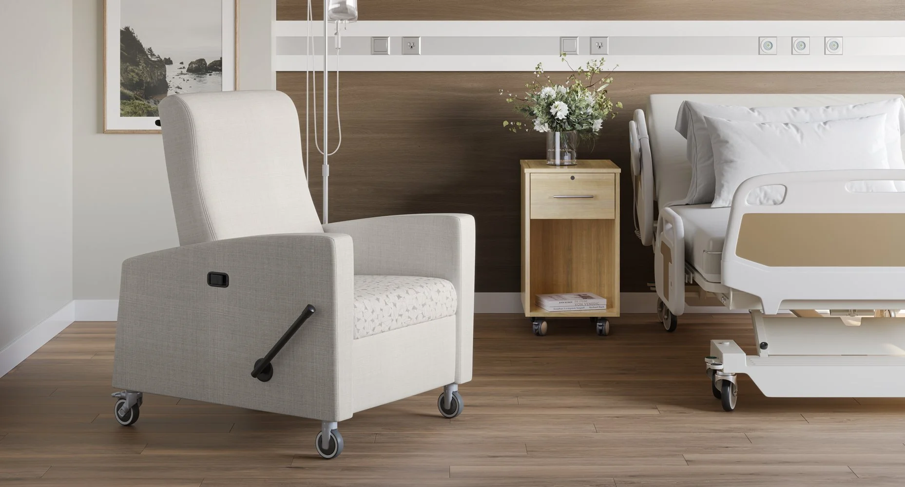 Hospital room with a bed, a rolling wooden nightstand with flowers, an armchair, and medical equipment