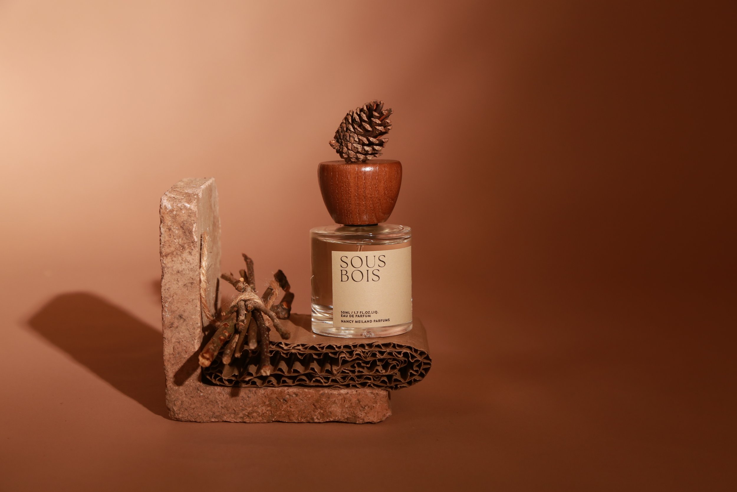 ous Bois Eau de Parfum by Nancy Meiland — nominated Best New Independent Fragrance 2020, styled with pine cone and forest botanicals by MUSE Creative Studio Brighton