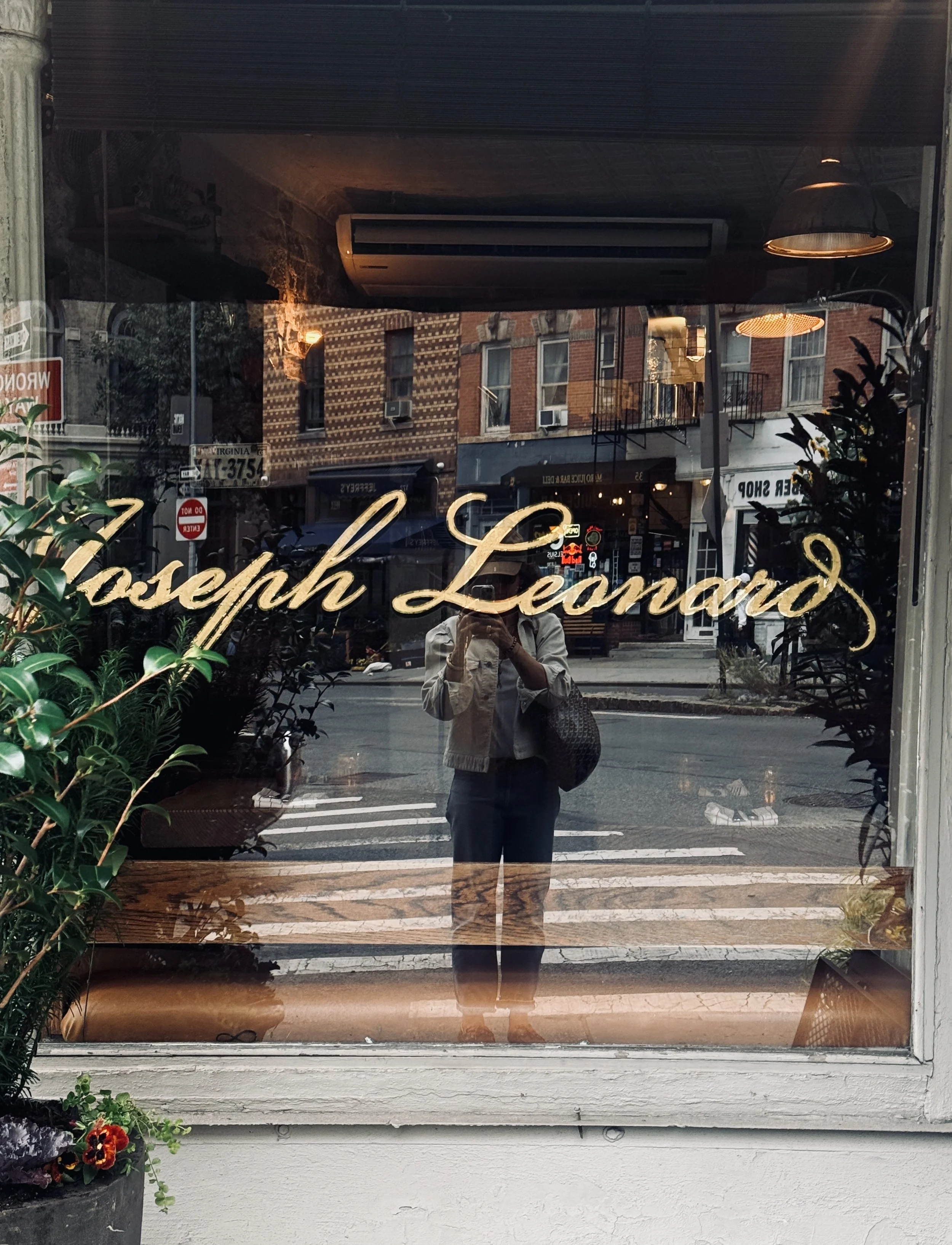 Joseph Leonard restaurant window with gold script lettering, West Village