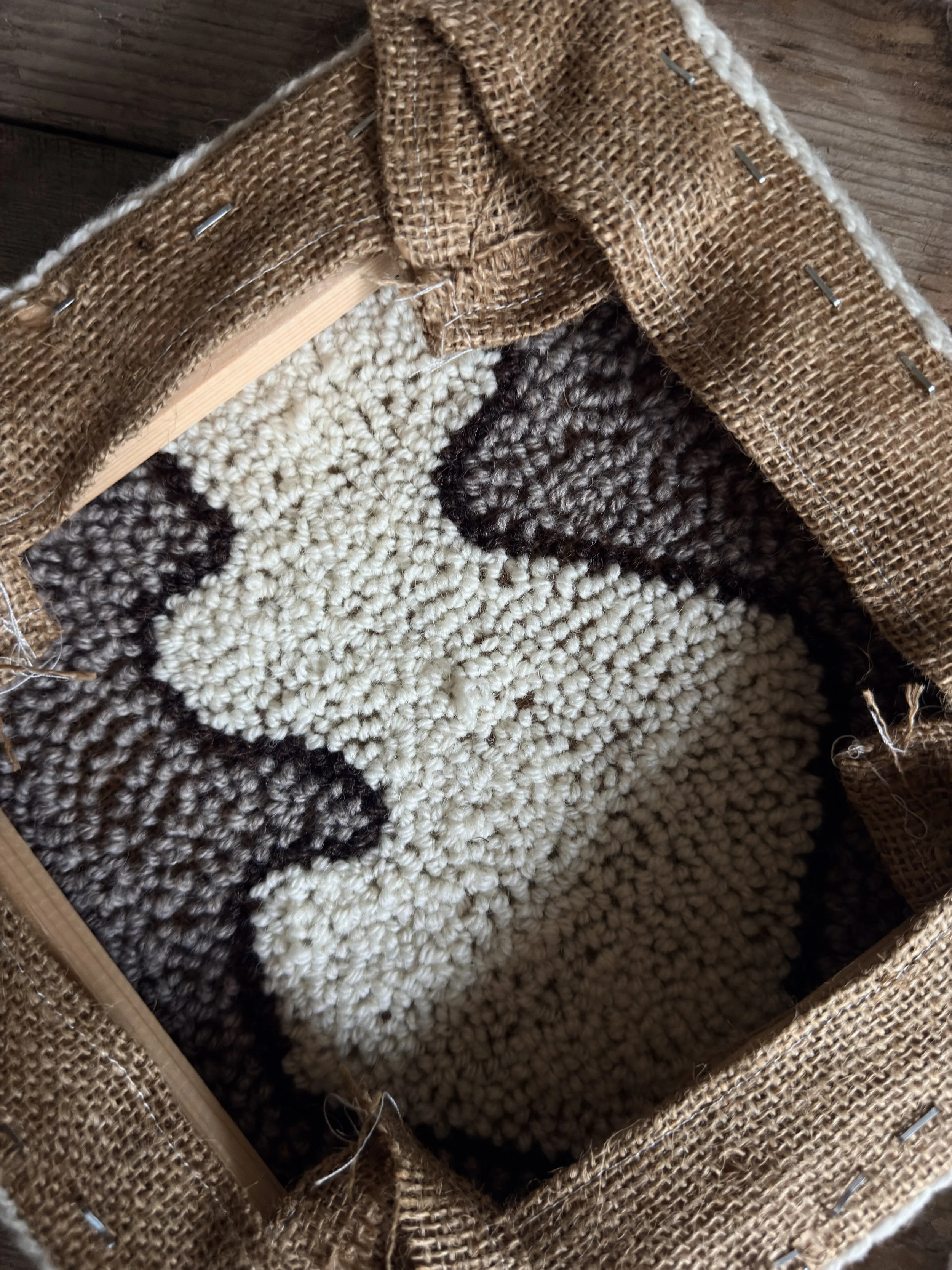 hand-punched Romney wool textile artwork in packaging