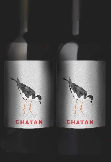 Two wine bottles with labels featuring a watercolor illustration of a crane, with the word "CHATAN" in red at the bottom.