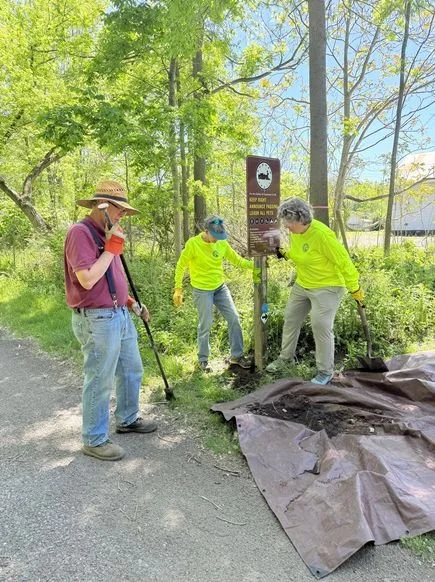Installing a new Pomeroy sign on the Auburn Trail