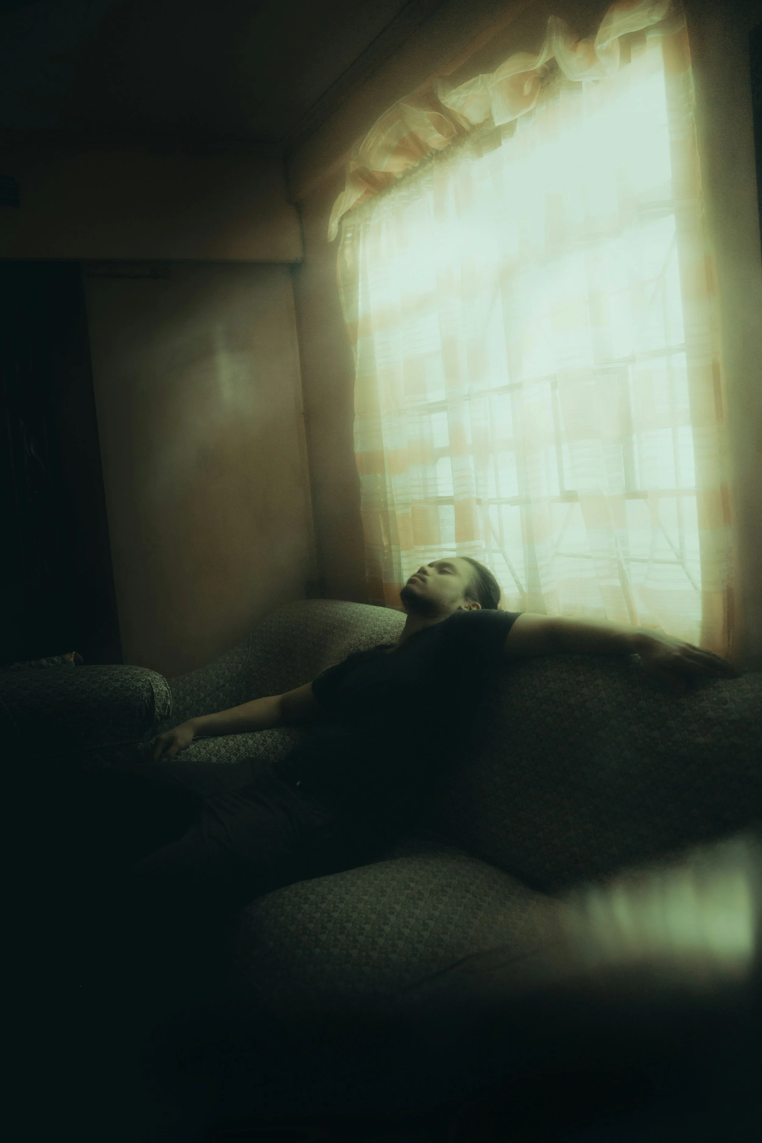 The Cost of Standing Near: What Years of Vigilance Do to the Helper's Brain