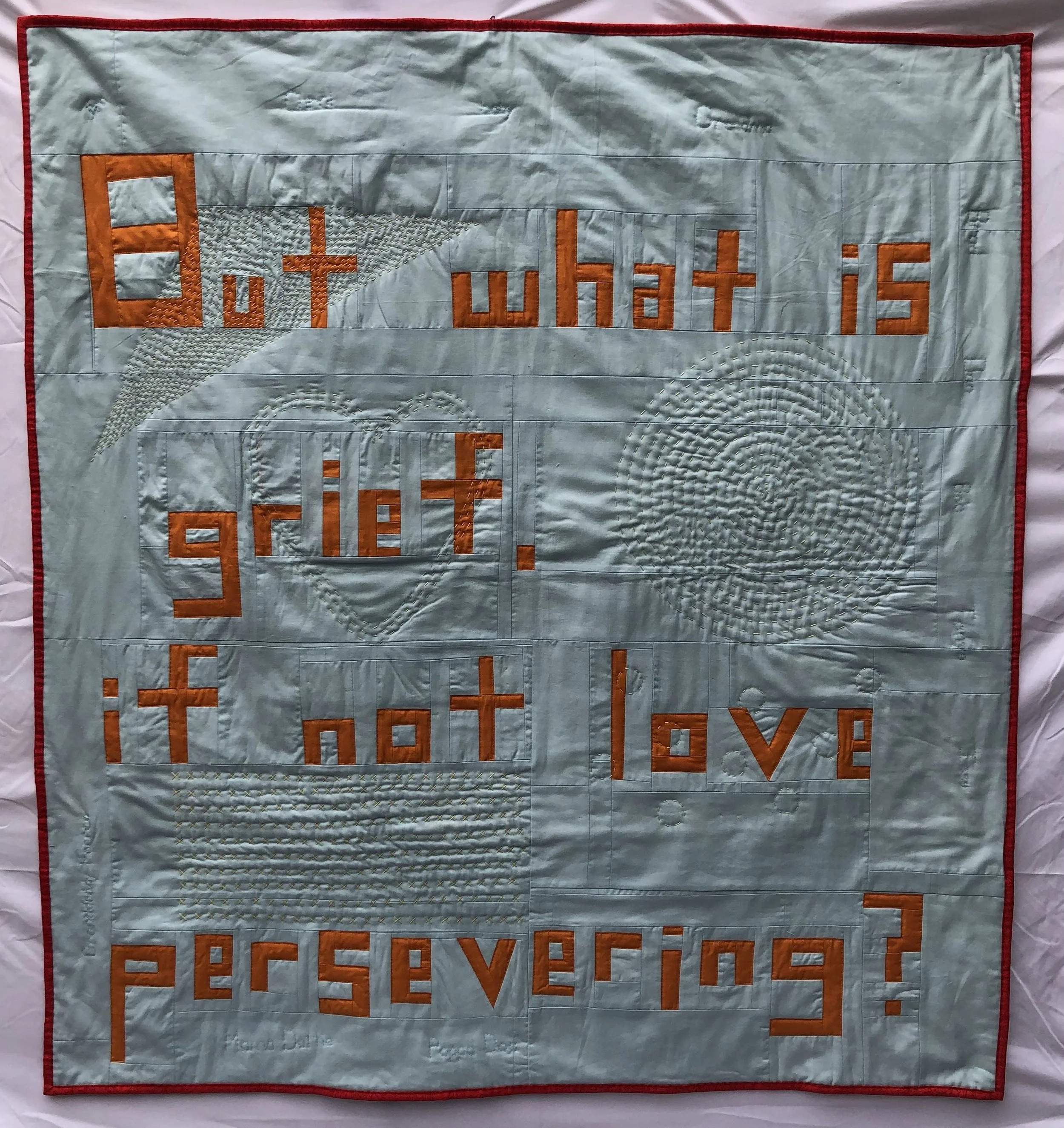 Grief Quilt
2023
Cotton fabric, batting, and thread,
46" x 49.5",
Hung in Quilty Pleasures at Elephant Gallery, 2023
Sold.

This quilt contains metaphor upon metaphor: beautiful front, messy back, emotionally significant fabric and colors, and stitch