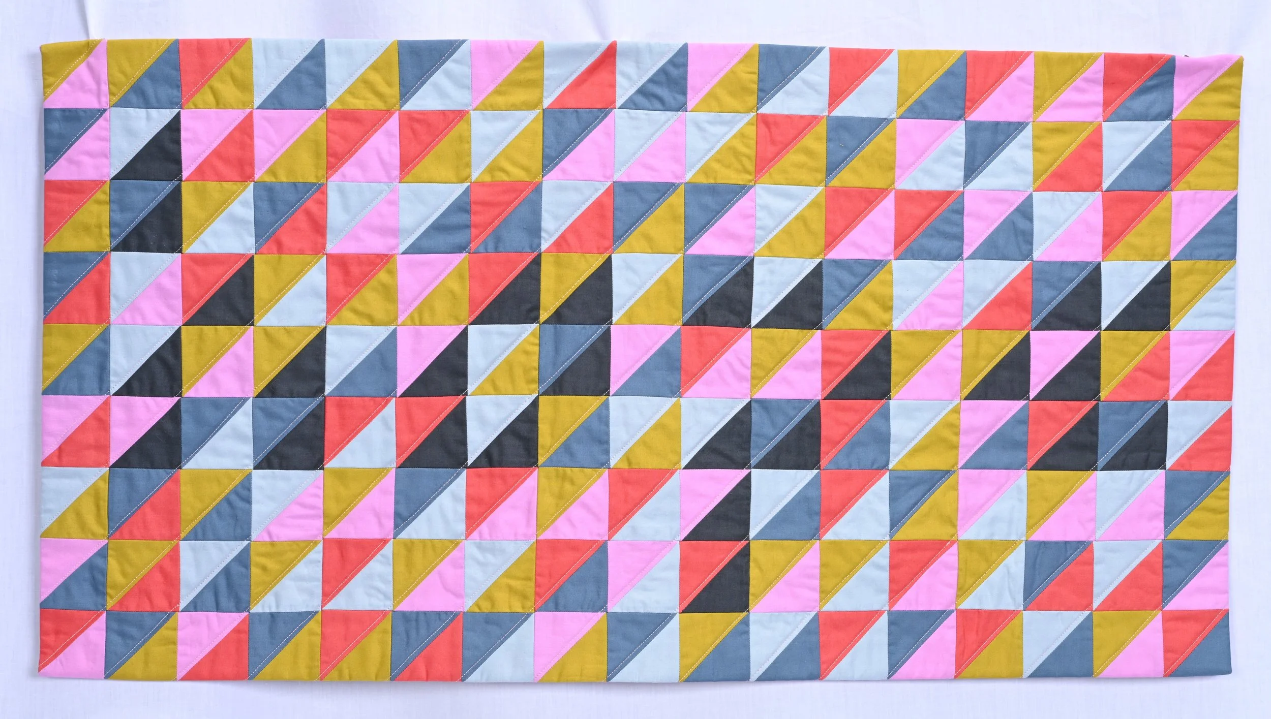 Hidden Word (Hope)
2024
Cotton fabric and batting, polyester thread
33.5" x 17.5"

I believe that hope is always within reach, but it’s not always easy to see.
