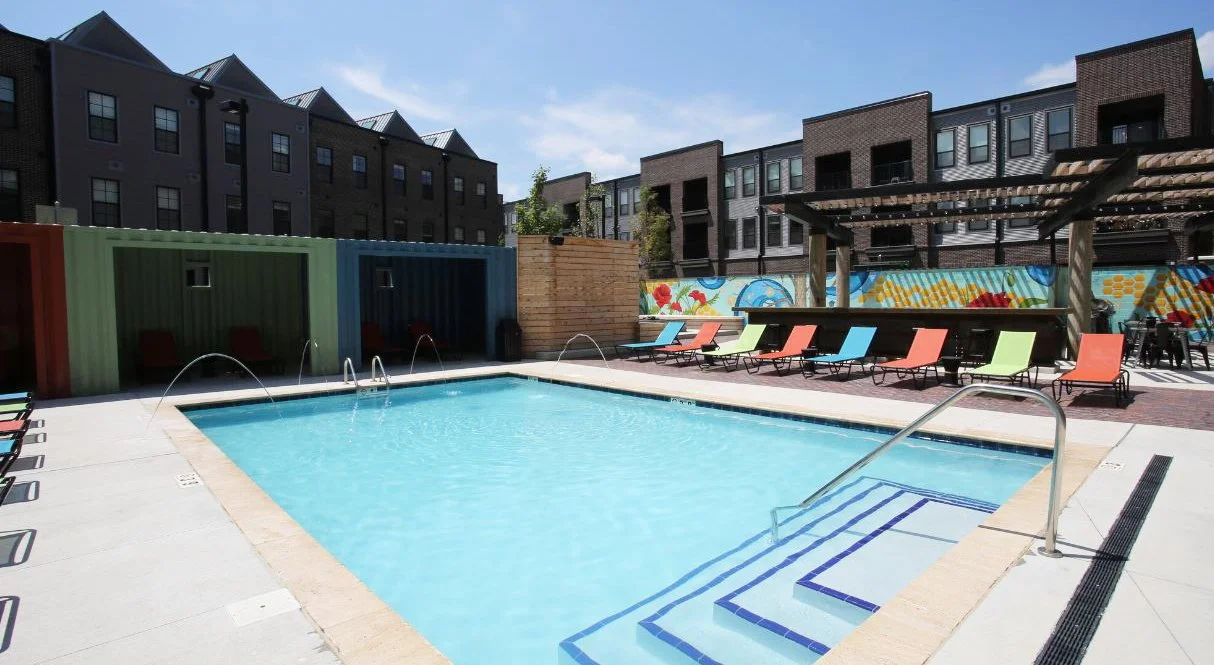 townhomes and gardens from pool.JPG