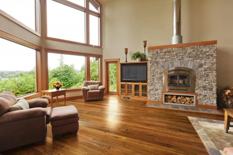 Whether exotic or domestic, Johnson Hardwood travels the globe in search of unique grain patterns, durable woods, and responsibly harvested trees. Harvested wood is cut into planks and hand carved for a custom floor look.