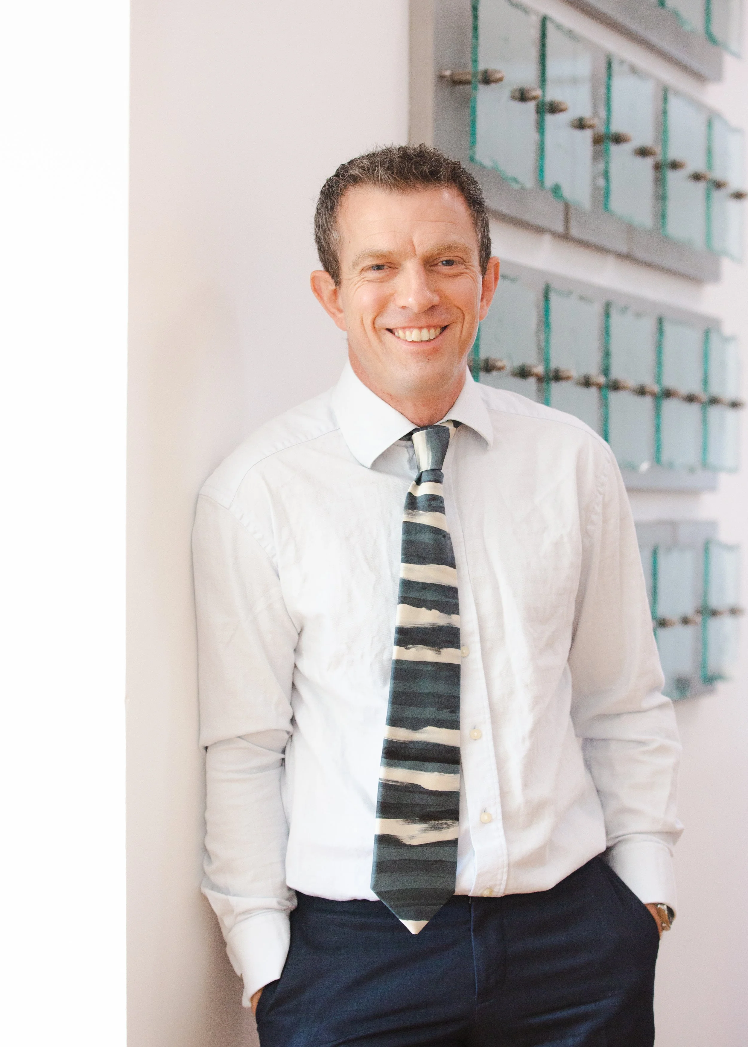 Dr Mike Marriott, Clinical Psychologist (Stood by a wall)