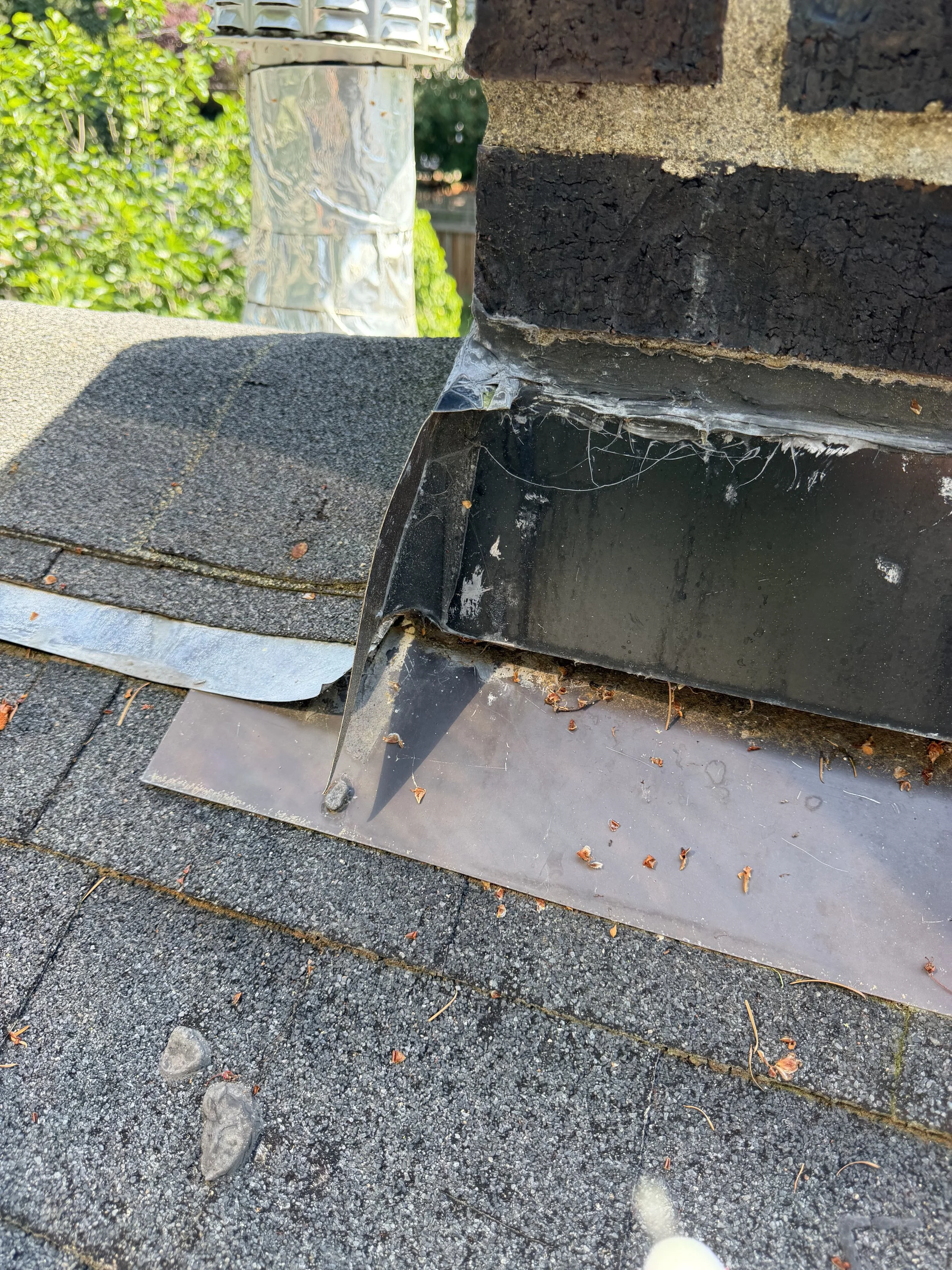 What Chimney Flashing Failure Actually Looks Like…And What It Means