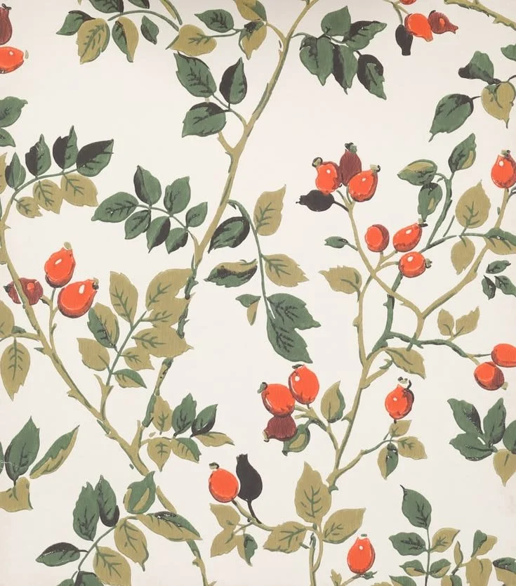 Pattern of green and beige leaves with red berries on white background.