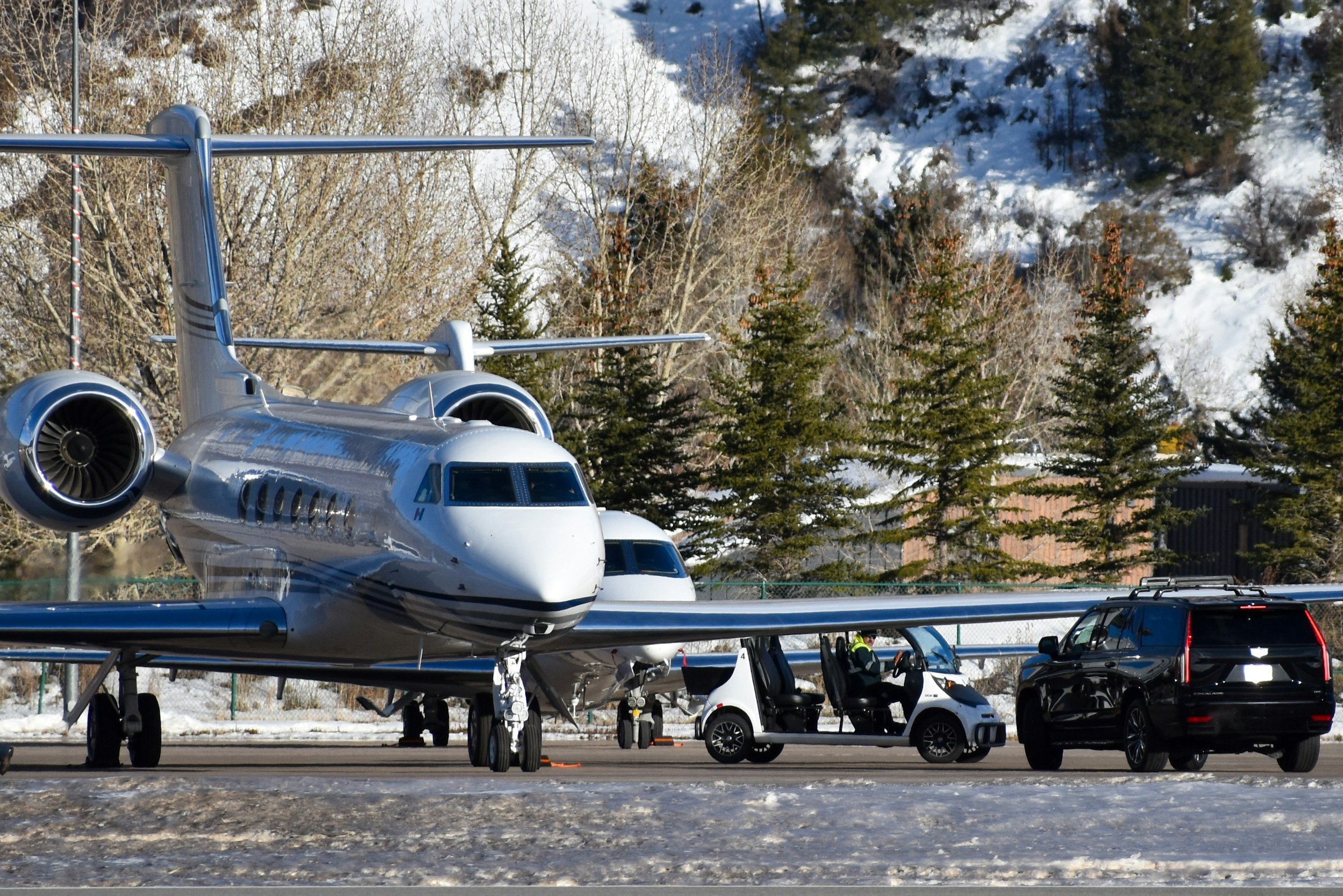 Business aircraft positioned on a winter ramp for executive travel operations.