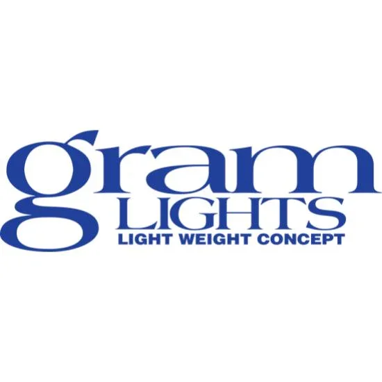 Logo for Gram Lights Light Weight Concept in dark blue text on a white background.