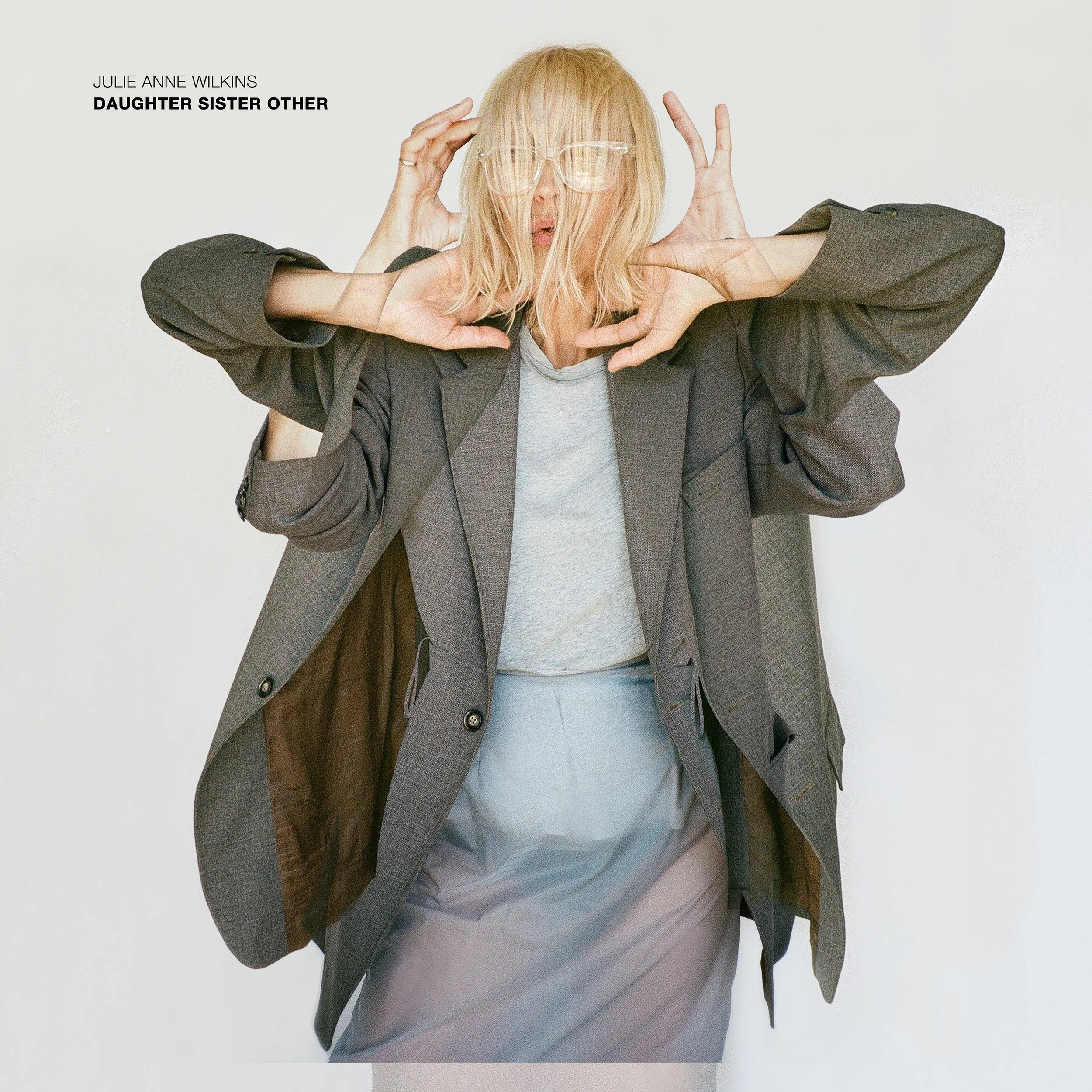 Julie Anne Wilkins' Daughter Sister Other album cover - multi limbed image of the artist wearing vintage menswear and Margiela