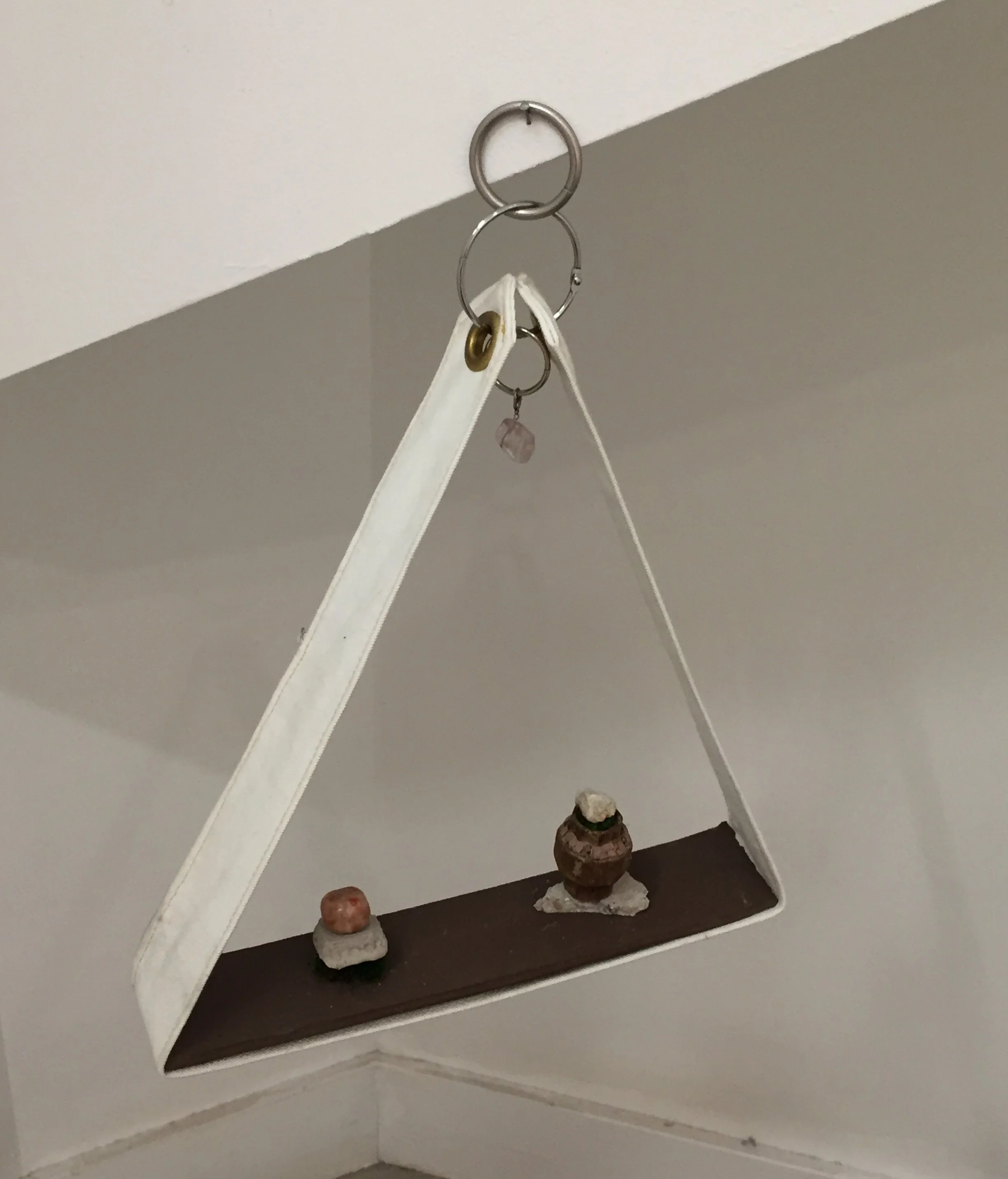 "Untitled" (Shelf Study)
/
canvas, fluorite bead, grommet, found rings, sunstone, concrete shards, moss, found rusty hardware, unfired clay with seed inlays, ceramic slab
/
(2019)