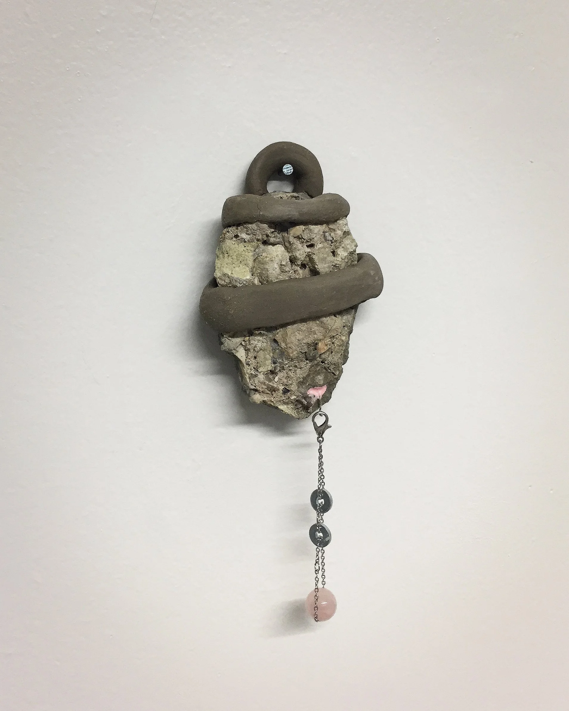 "Untitled" (Concrete Study)
/
sidewalk chunk, soft pink nail polish, unfired clay, chain, two found metal washers, rose quartz bead, wire
/
(2019)