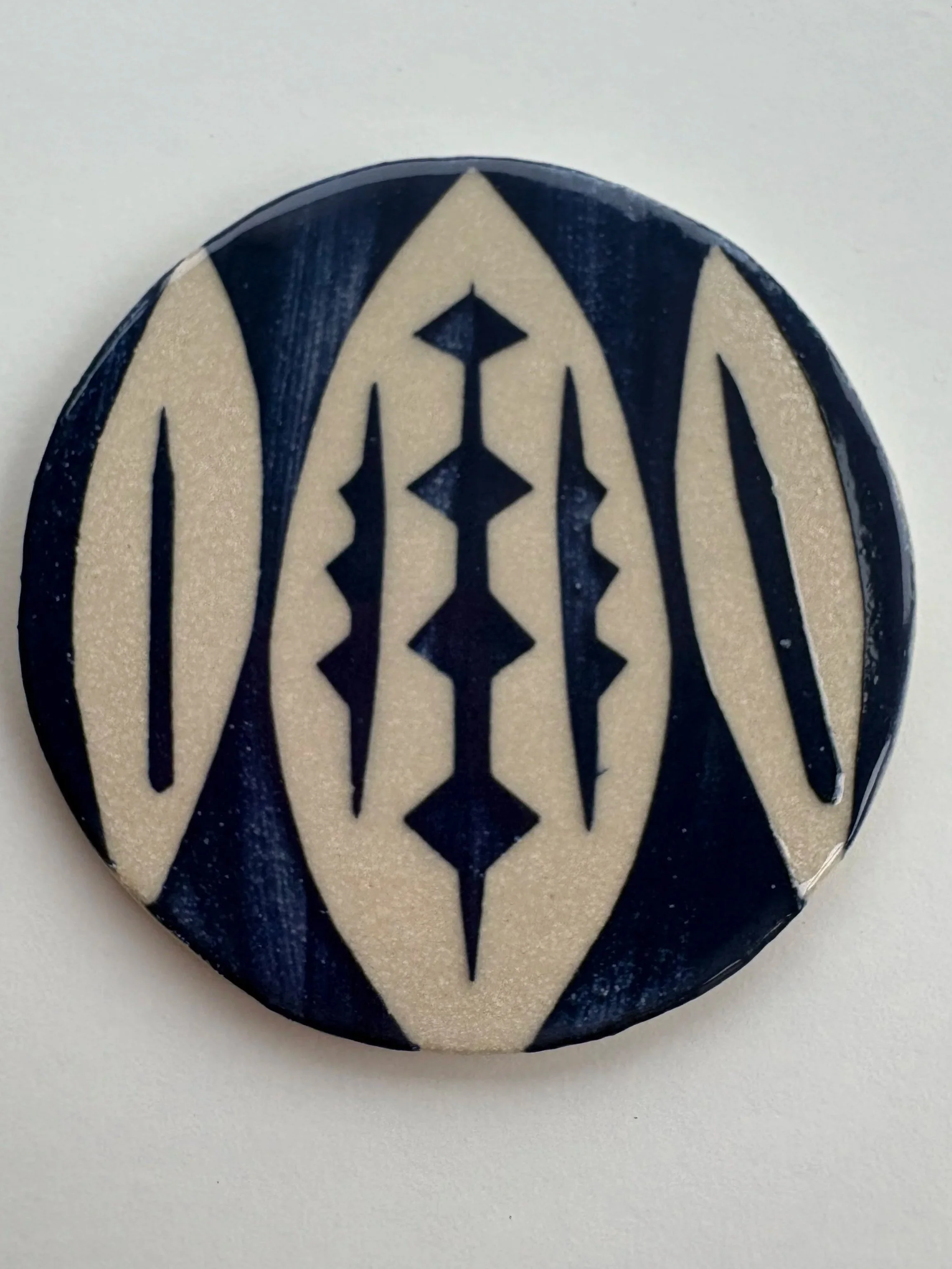 Abstract leaf coaster 1 - white stoneware with blue decorating slip