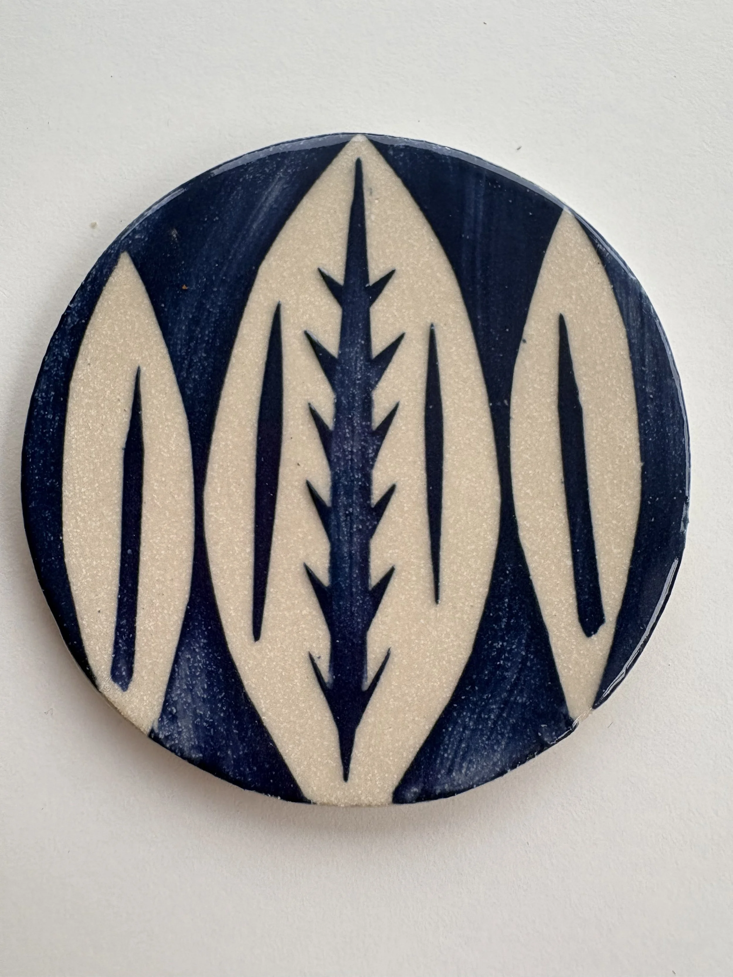 Abstract leaf coaster 2 - white stoneware with blue decorating slip